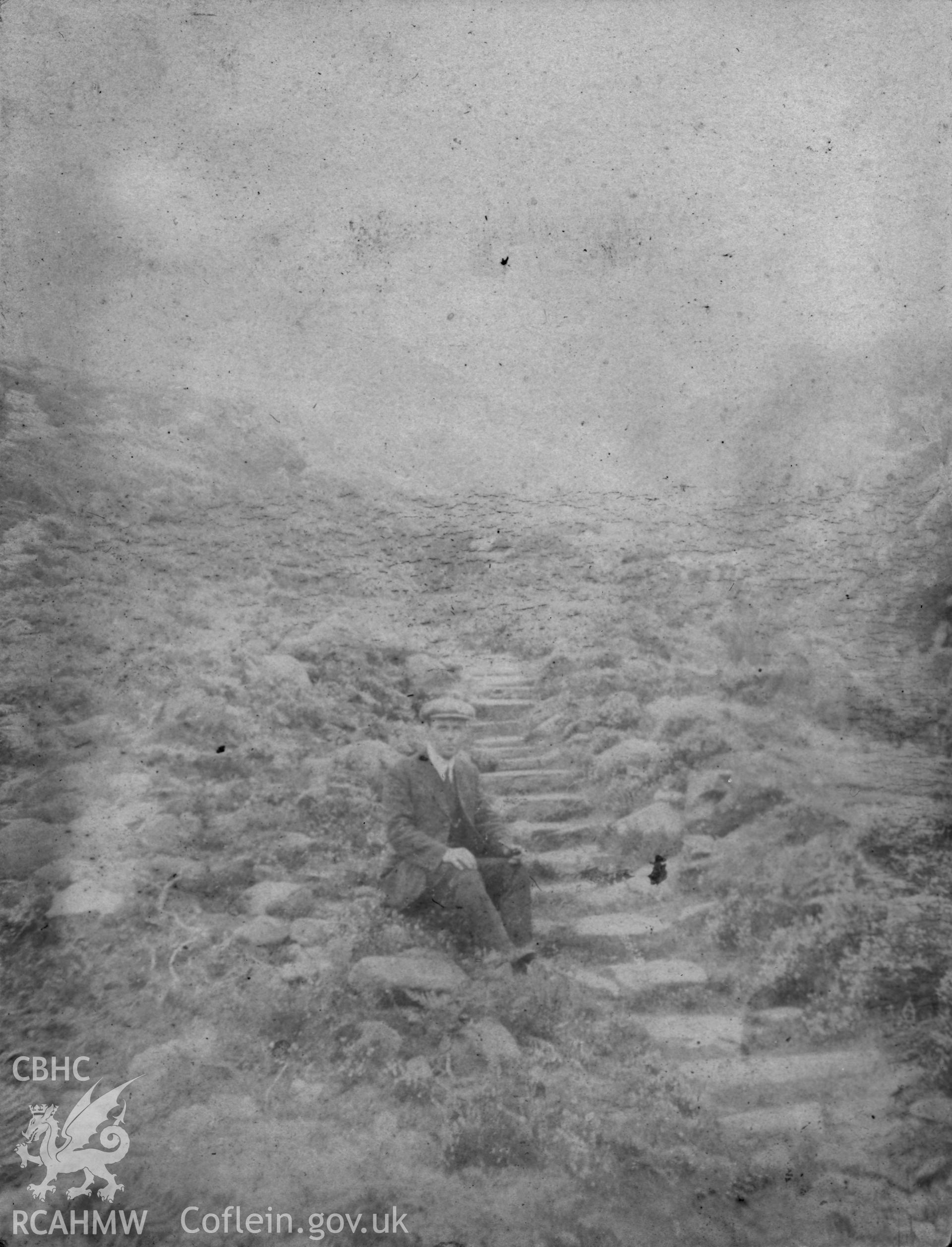 'Roman steps Drws Audwdwy 1913'.  Digitised from a photograph album showing views of Aberystwyth and District, produced by David John Saer, school teacher of Aberystwyth. Loaned for copying by Dr Alan Chamberlain.