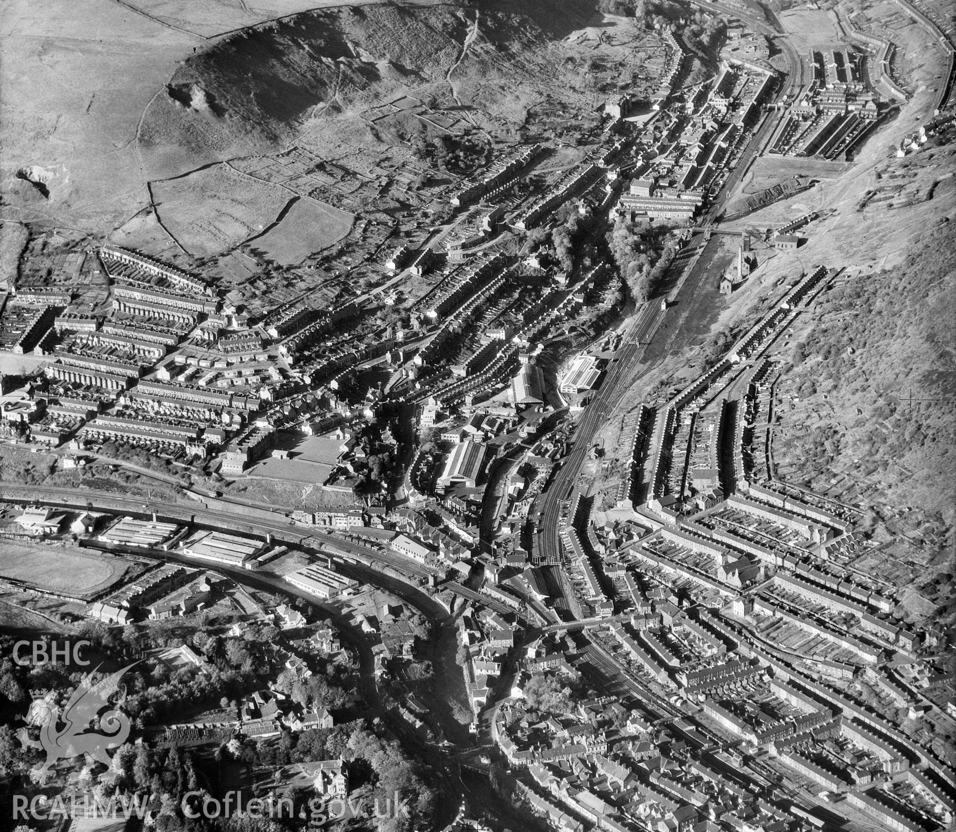 Distant view of Porthcawl showing Cymmer Greyhound Stadium and Manor farm in the foreground. Oblique aerial photograph, 5?" cut roll film.