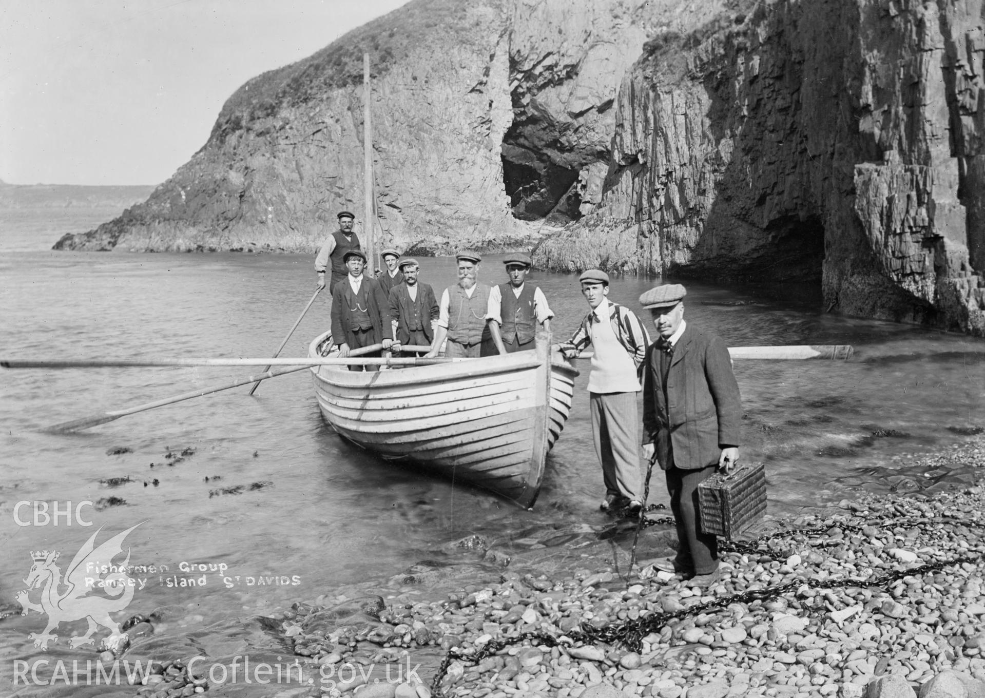Black and white glass negative showing "Fishermen Group Ramsey Island St Davids"