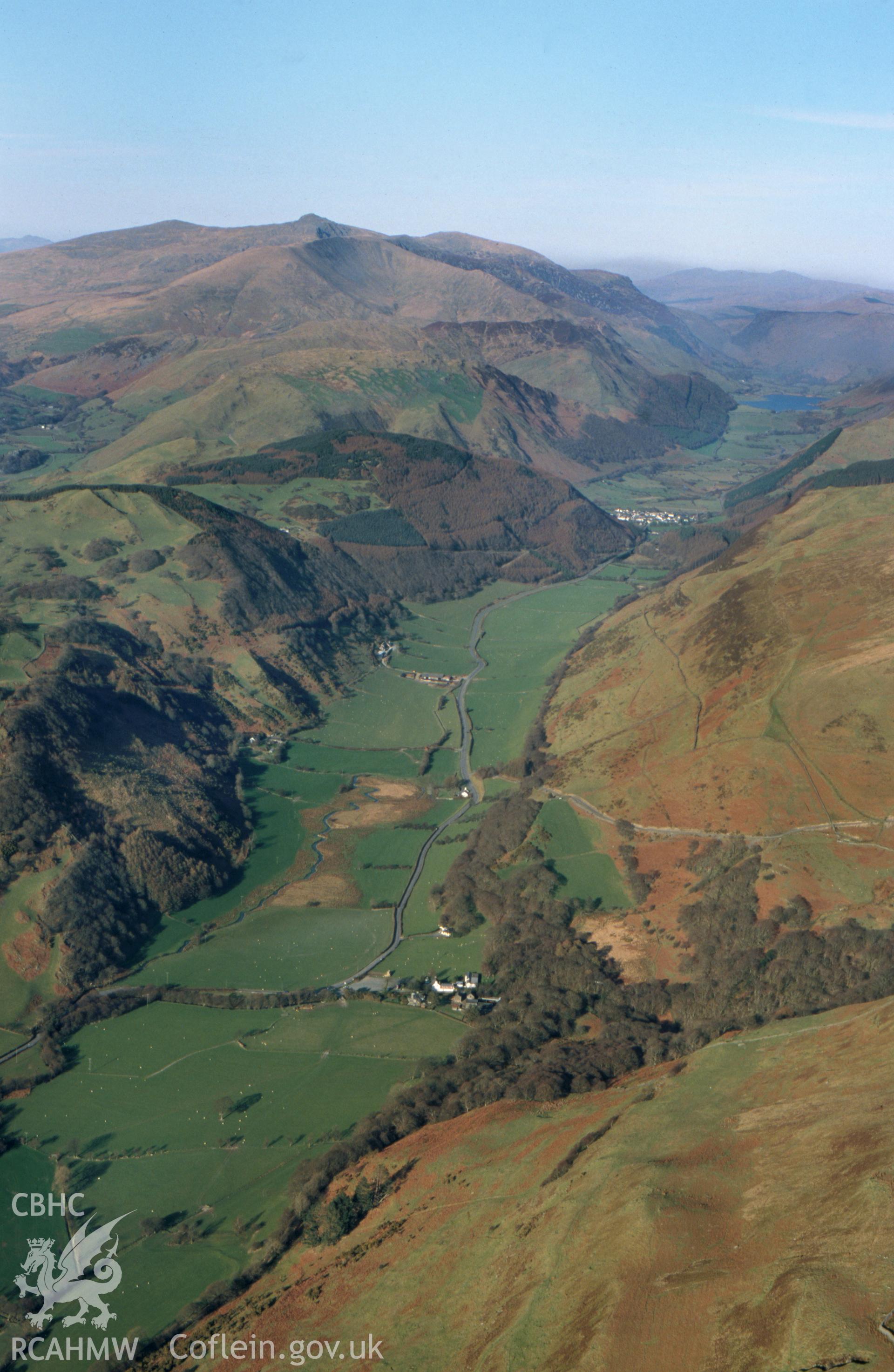 RCAHMW colour slide oblique aerial photograph of the Dolgoch landscape north-east to Tal-y-llyn, taken on 17/03/1999 by Toby Driver