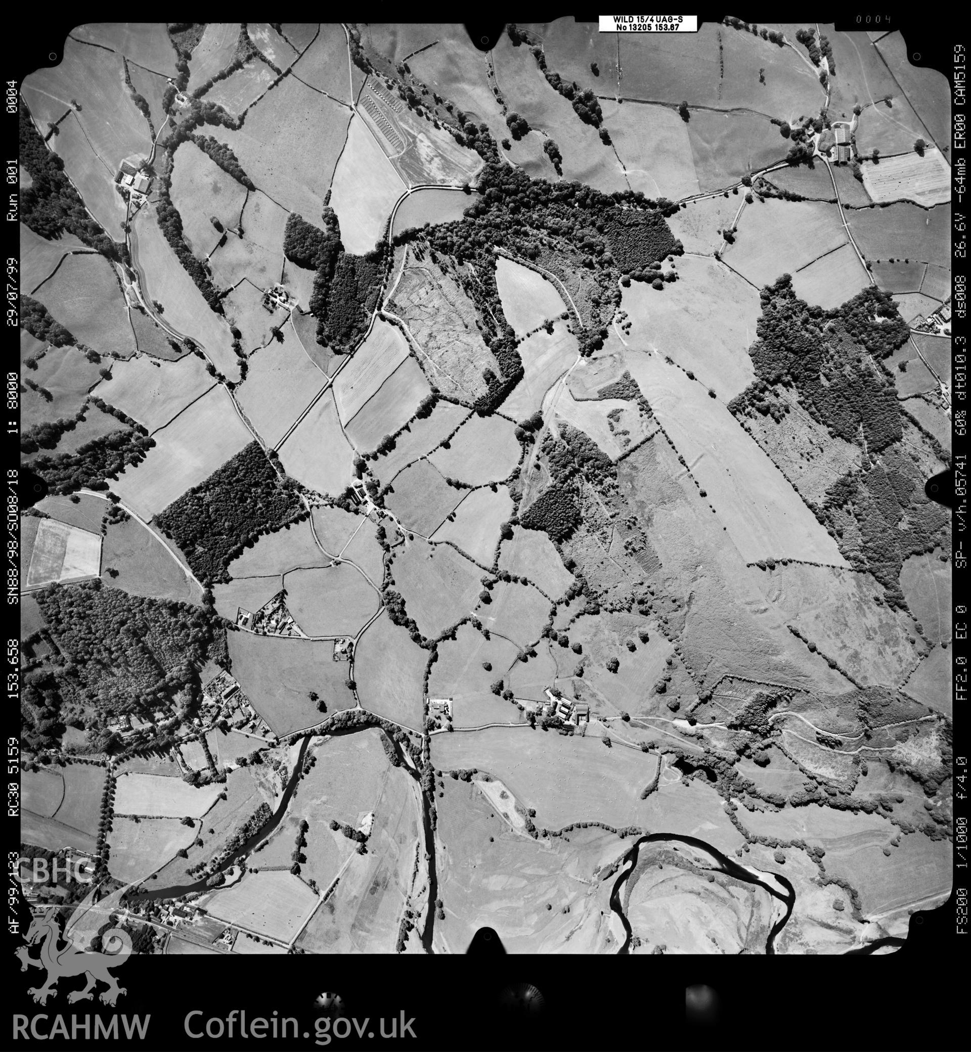 Digitized copy of an aerial photograph showing an area north-west of Llandinam, taken by Ordnance Survey,  1999.