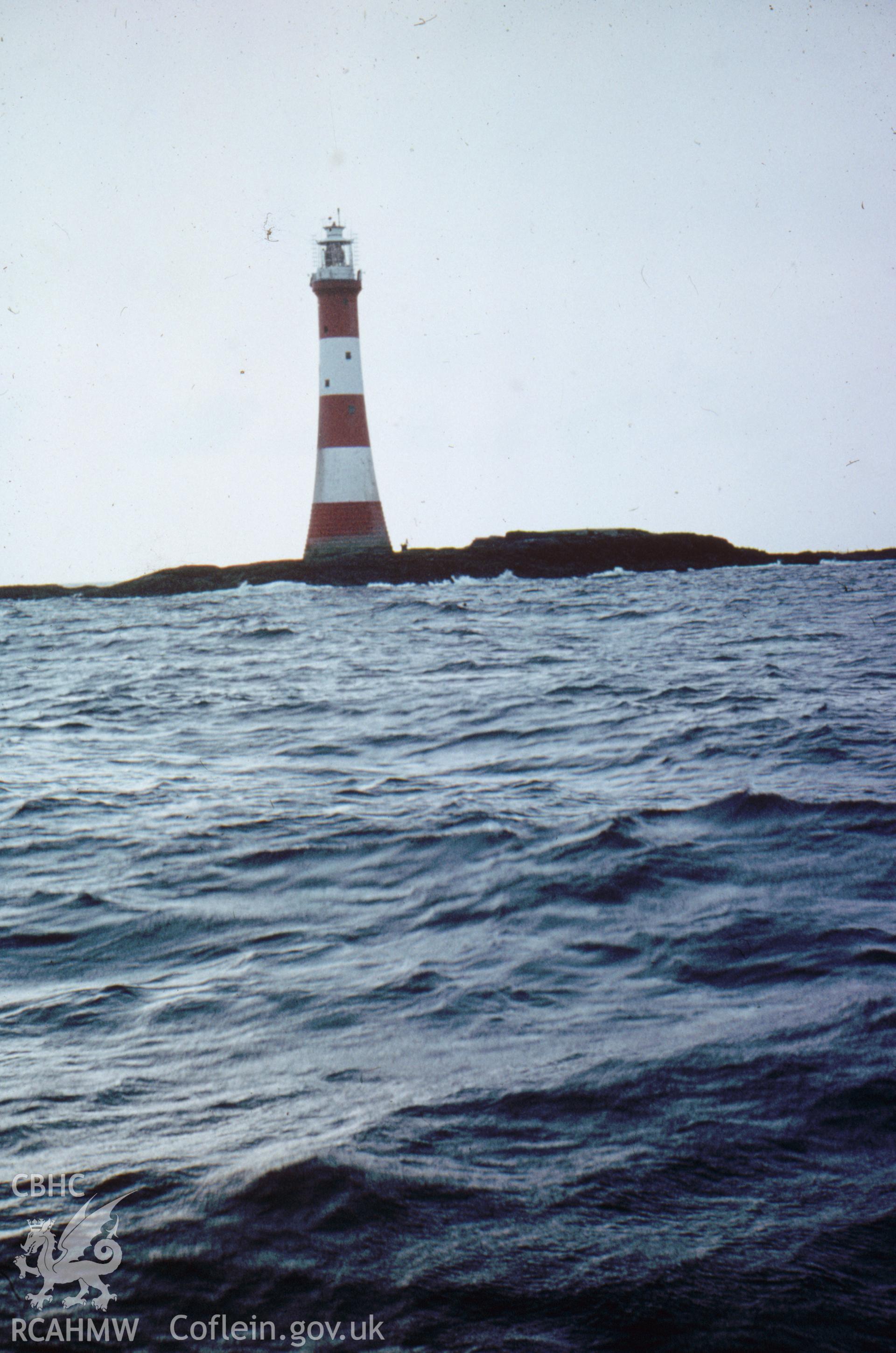 Colour slide showing view of the Smalls Lighthouse from the sea.