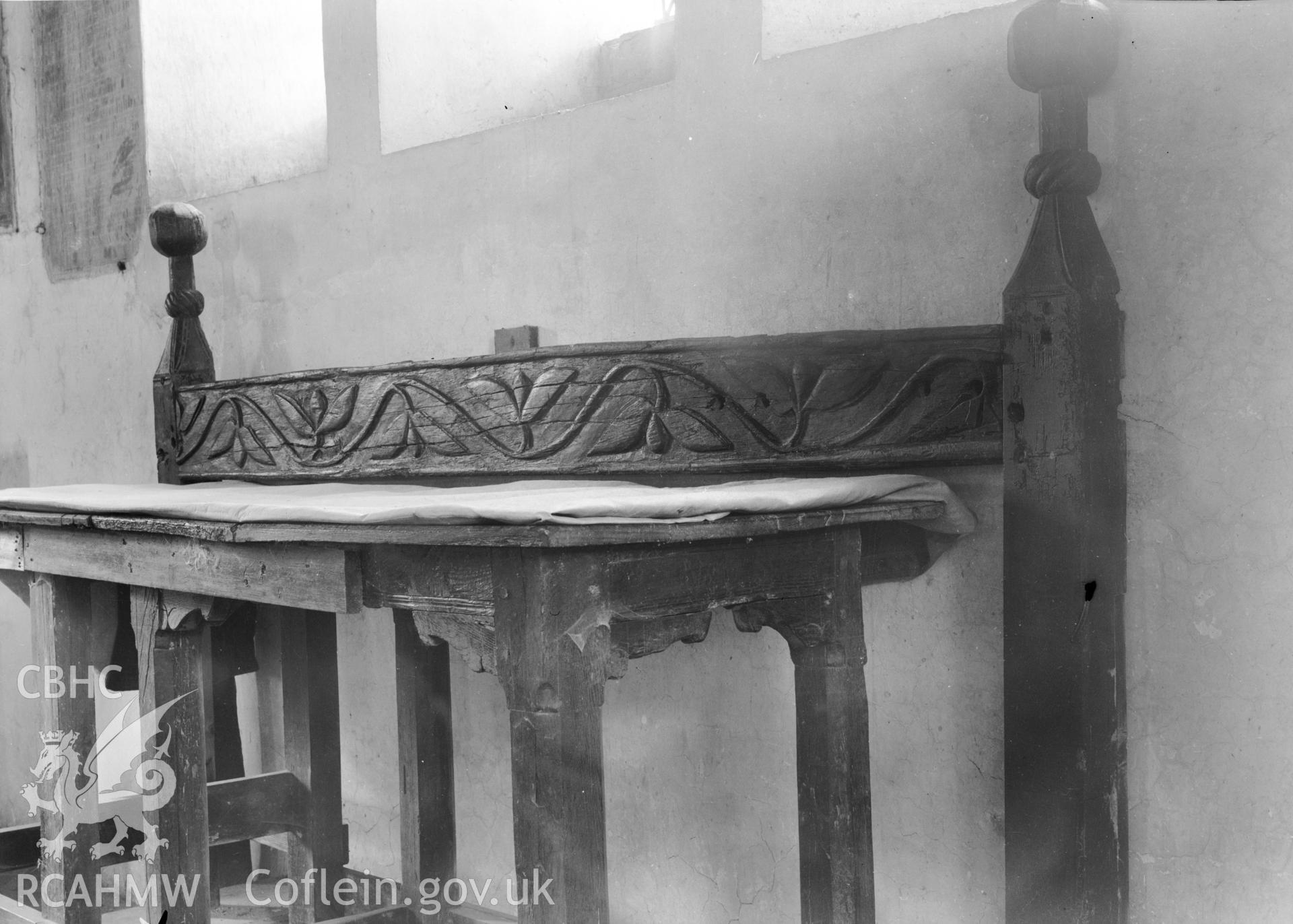 Interior view showing carved desk at St Brothen's Church, Llanfrothen taken 07.06.1941.