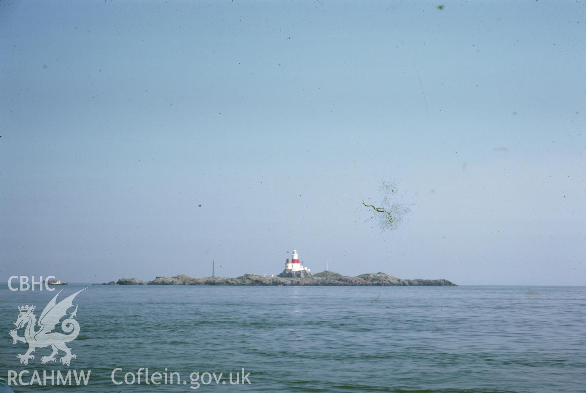 Colour slide showing Skerries Lighthouse from the distance.