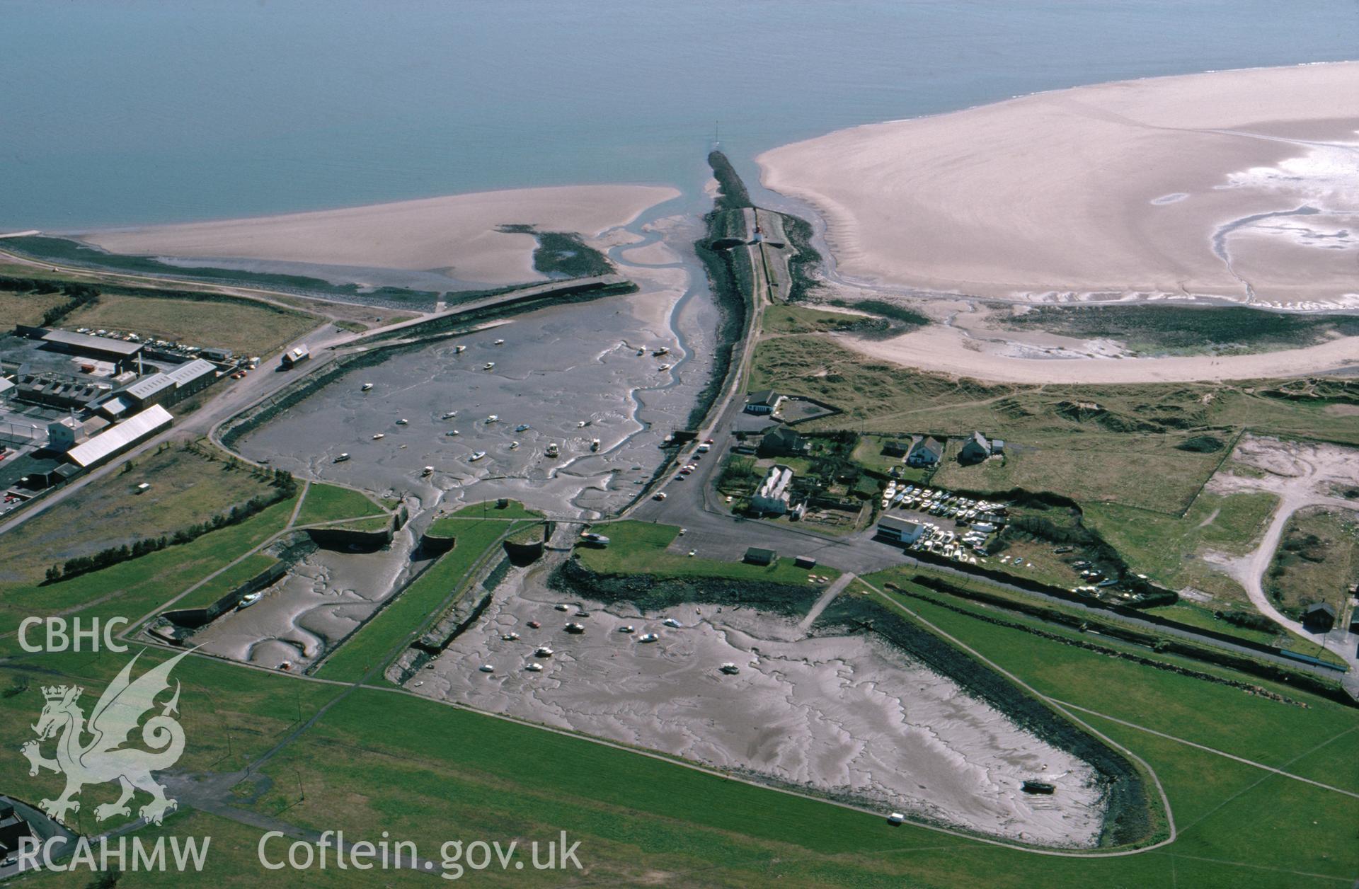 RCAHMW colour oblique aerial photograph of Burry Port Docks taken on 29/03/1995 by C.R. Musson