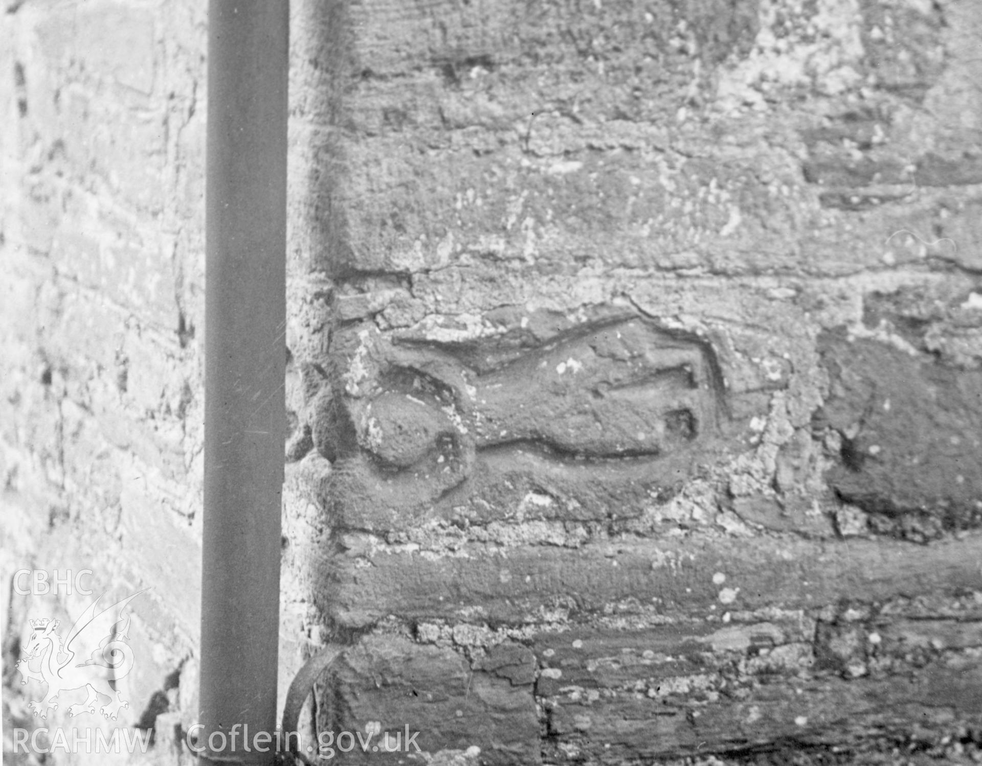 Detail of carved figure in exterior stonework of St Michael's Church, Bryngwyn.