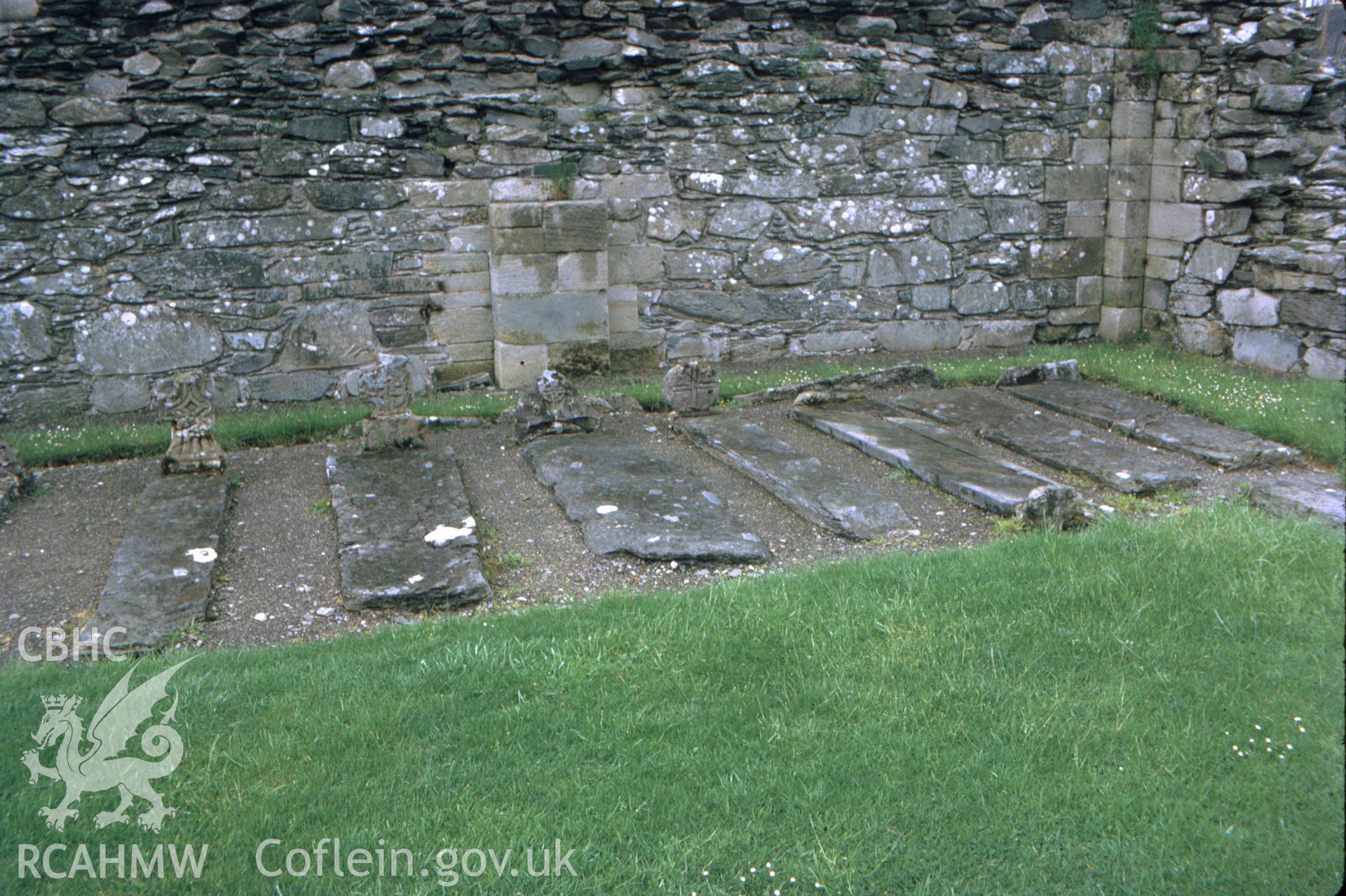 Colour slide showing memorial stones in the churchyard at St Mary's Church.