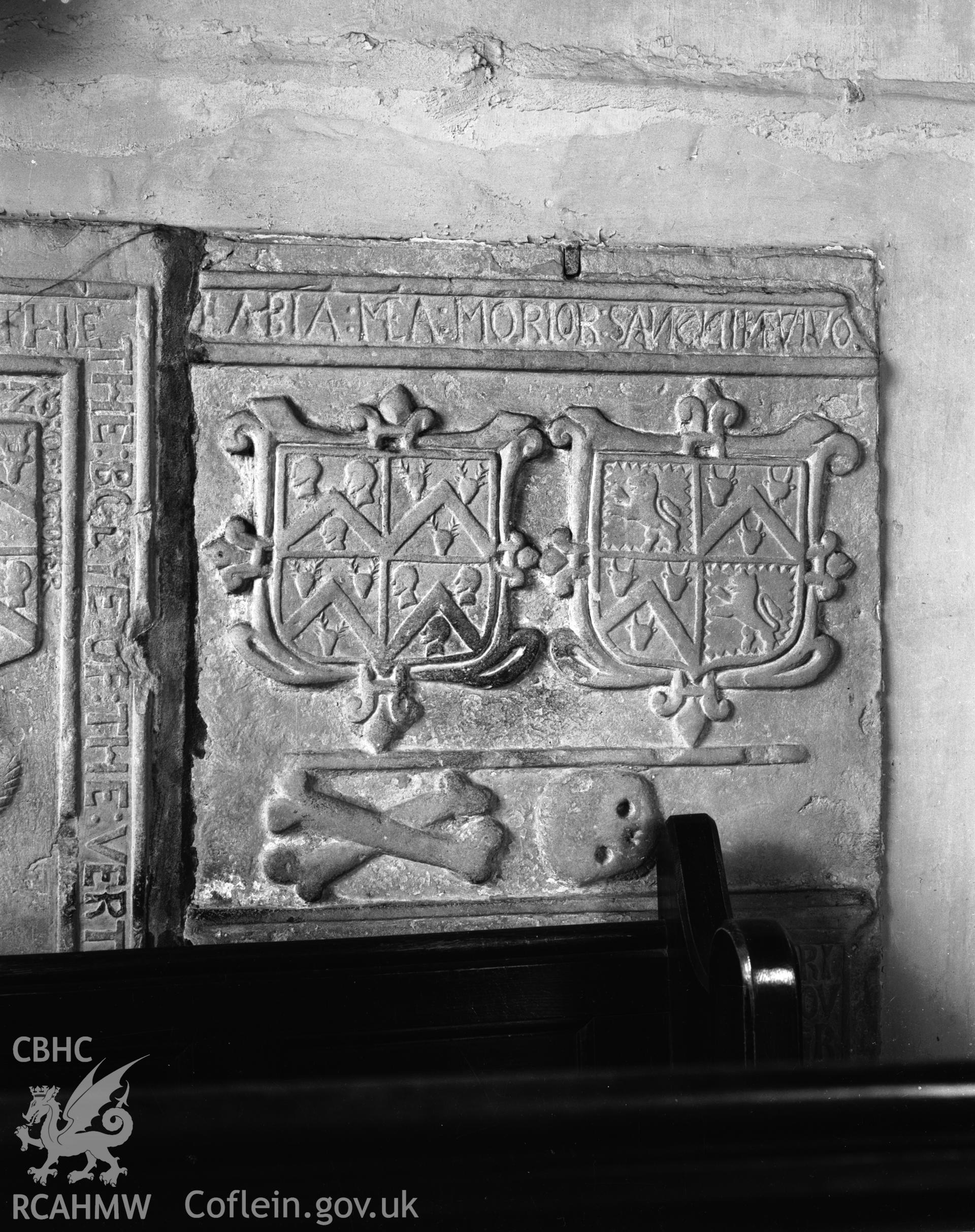 Interior view of St Marys Church Conwy showing crest on a tomb with skull and crossbones, taken in 10.09.1951.
