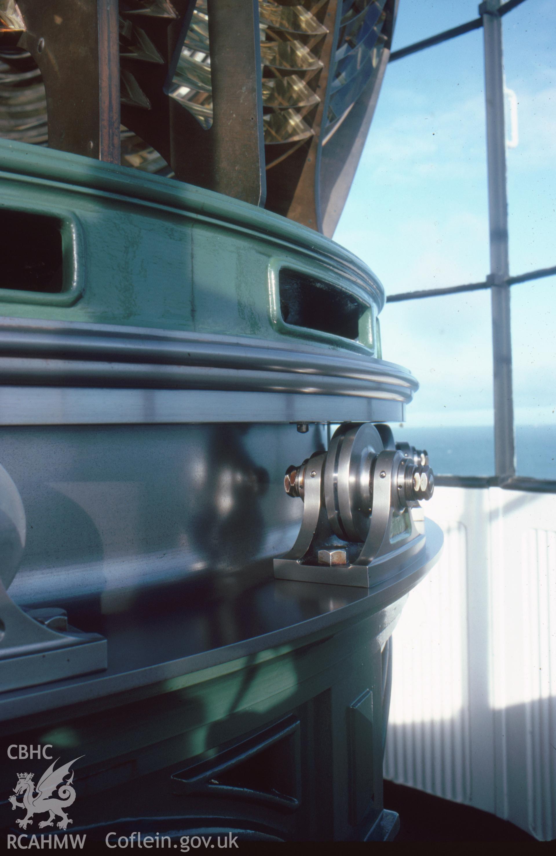 Colour slide, interior view showing lantern optic in the lighthouse.