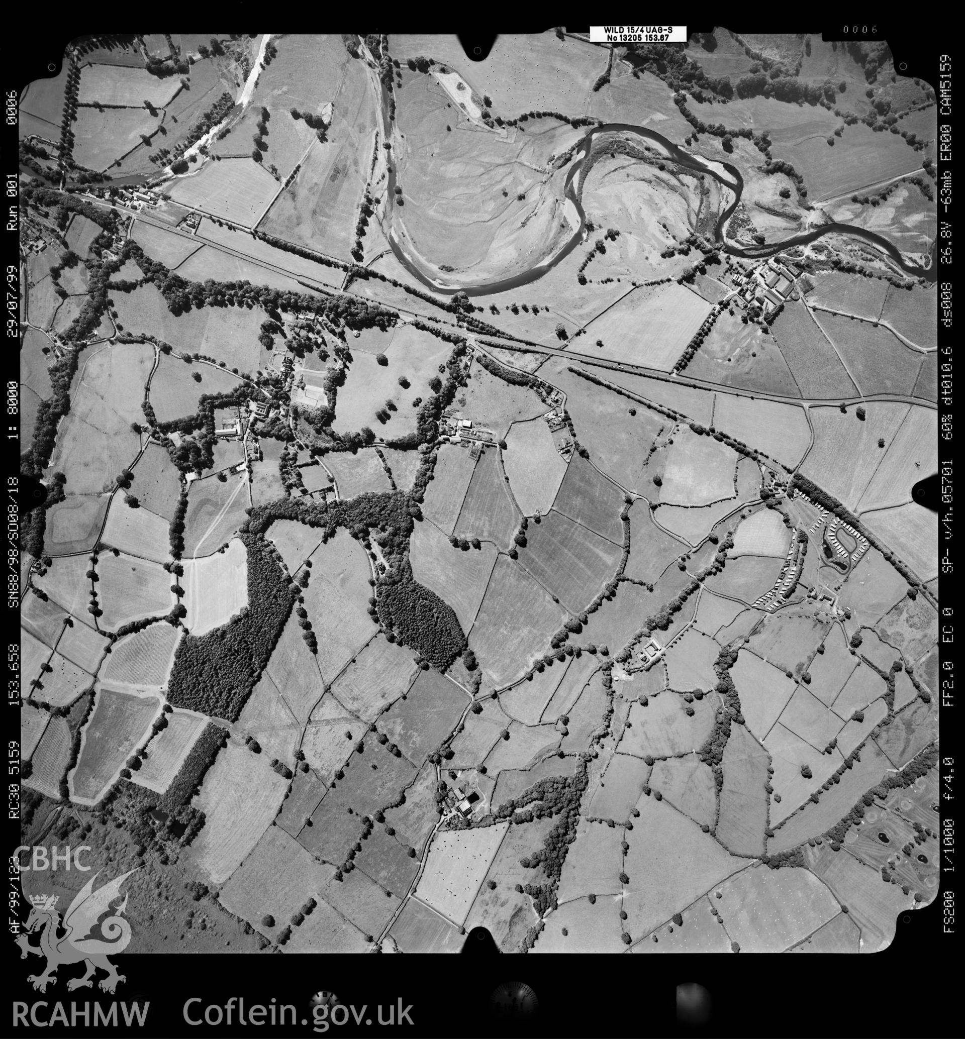 Digitized copy of an aerial photograph showing an area north-east of Llandinam, taken by Ordnance Survey,  1999.