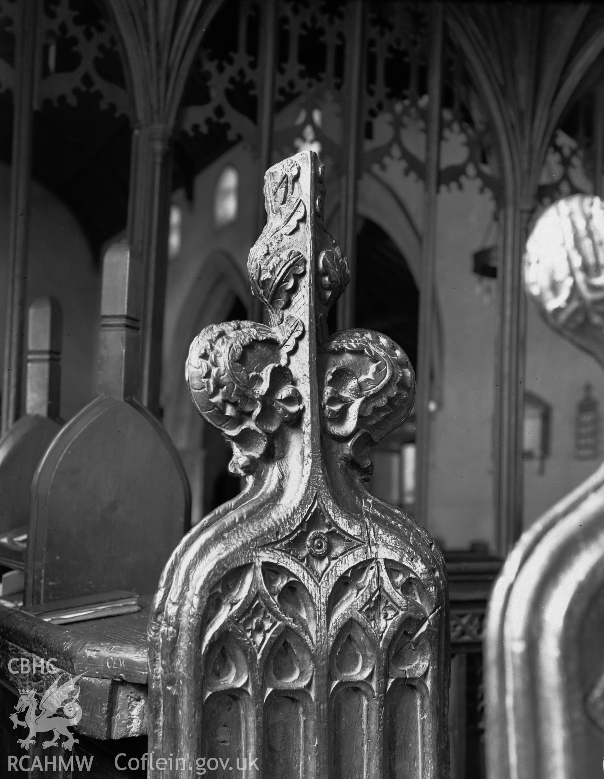 Interior view of St Marys Church Conwy showing bench end carvings, taken in 10.09.1951.