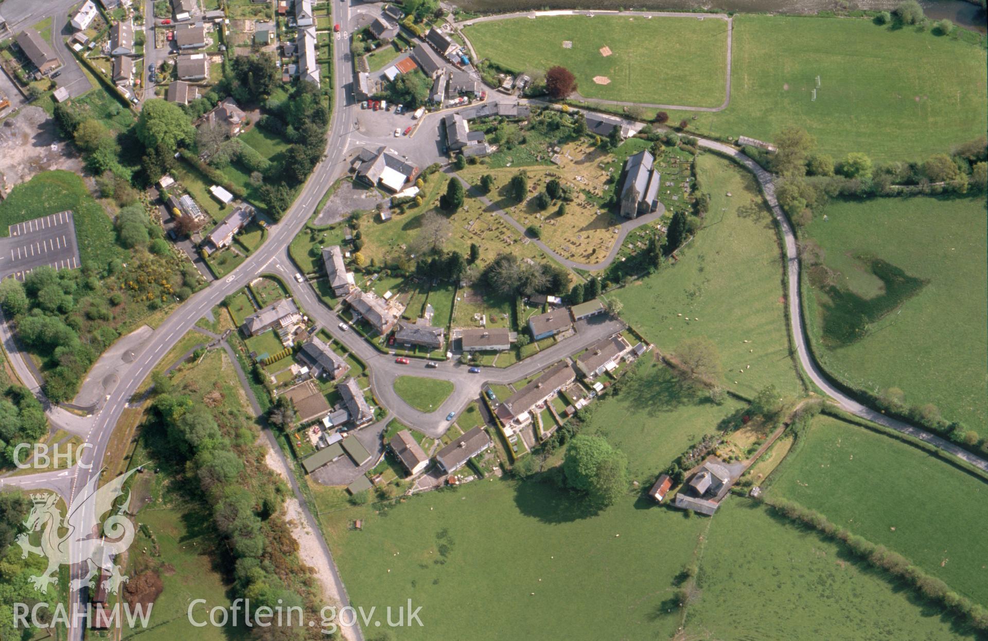 RCAHMW colour slide aerial photograph of Rhayader, Tomen Llansantffraid. Taken by Toby Driver on 16/05/2002