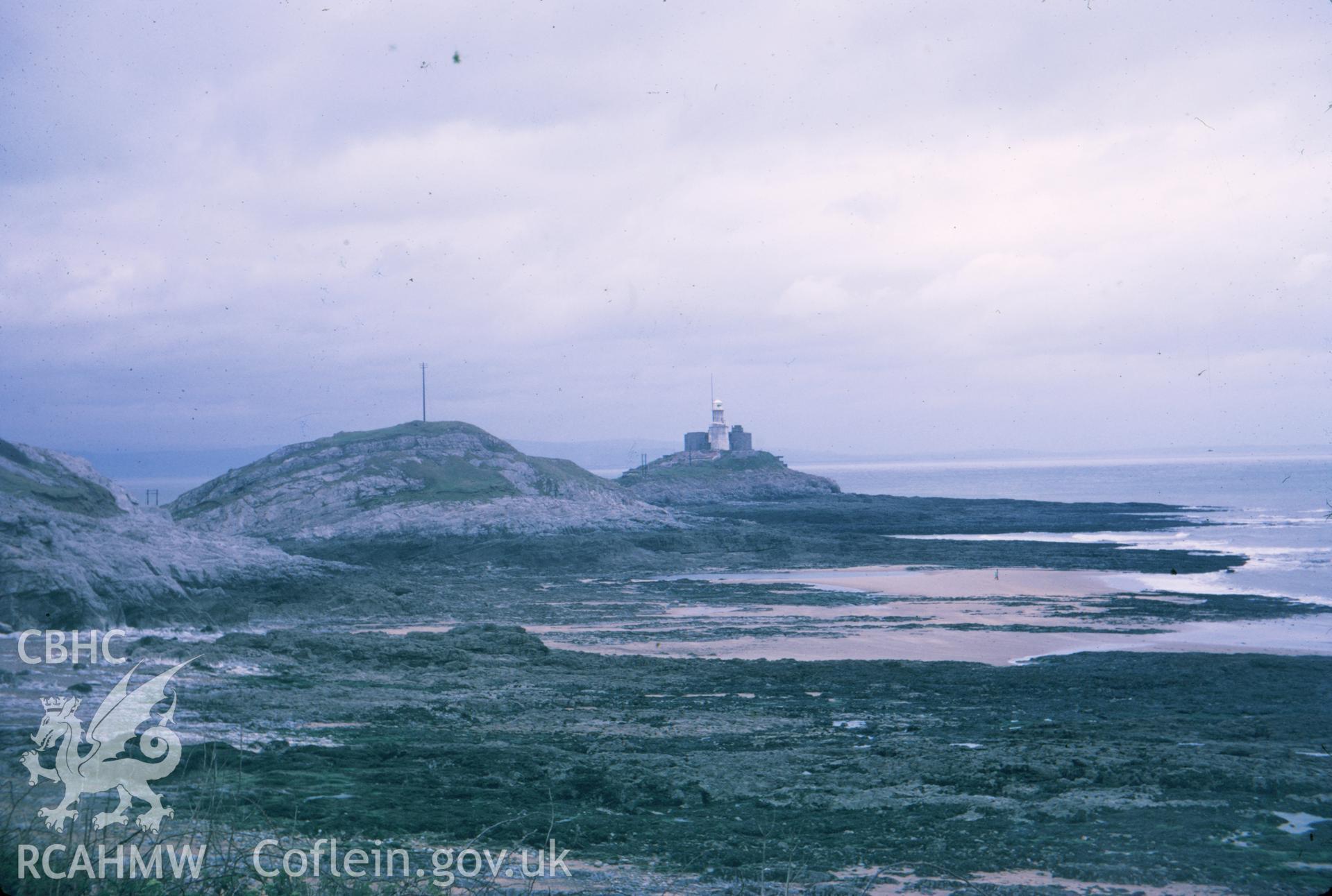 Colour slide showing distant view of Mumbles Lighthouse.