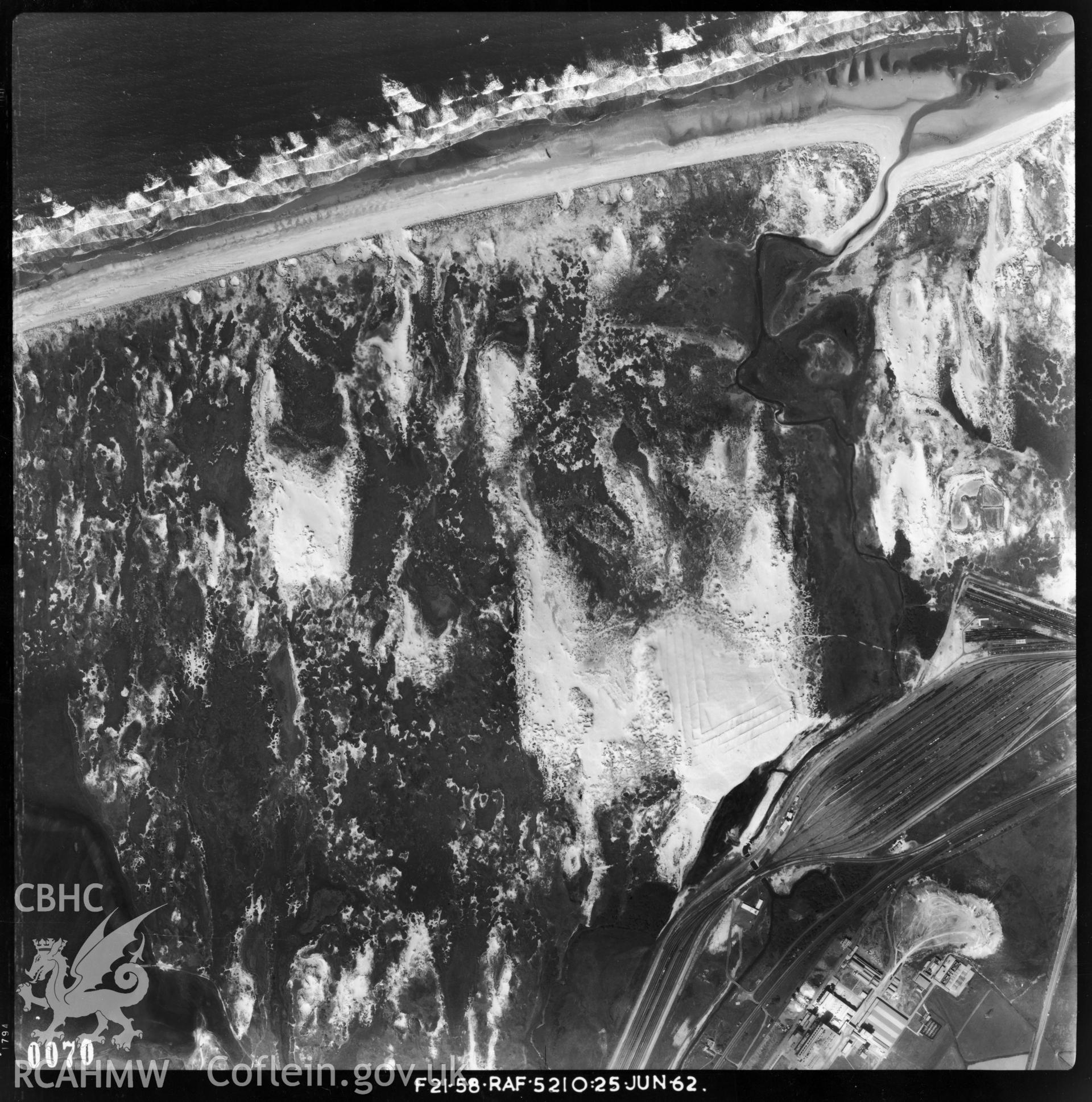 Black and white vertical aerial photograph, taken in 1962 by the RAF, showing the Kenfig area at a height of 30,000'