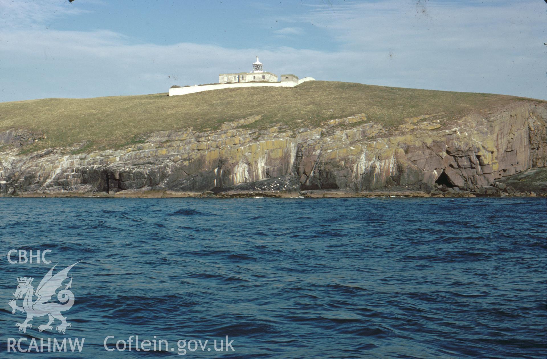Colour slide showing St Tudwal's Lighthouse from the sea.