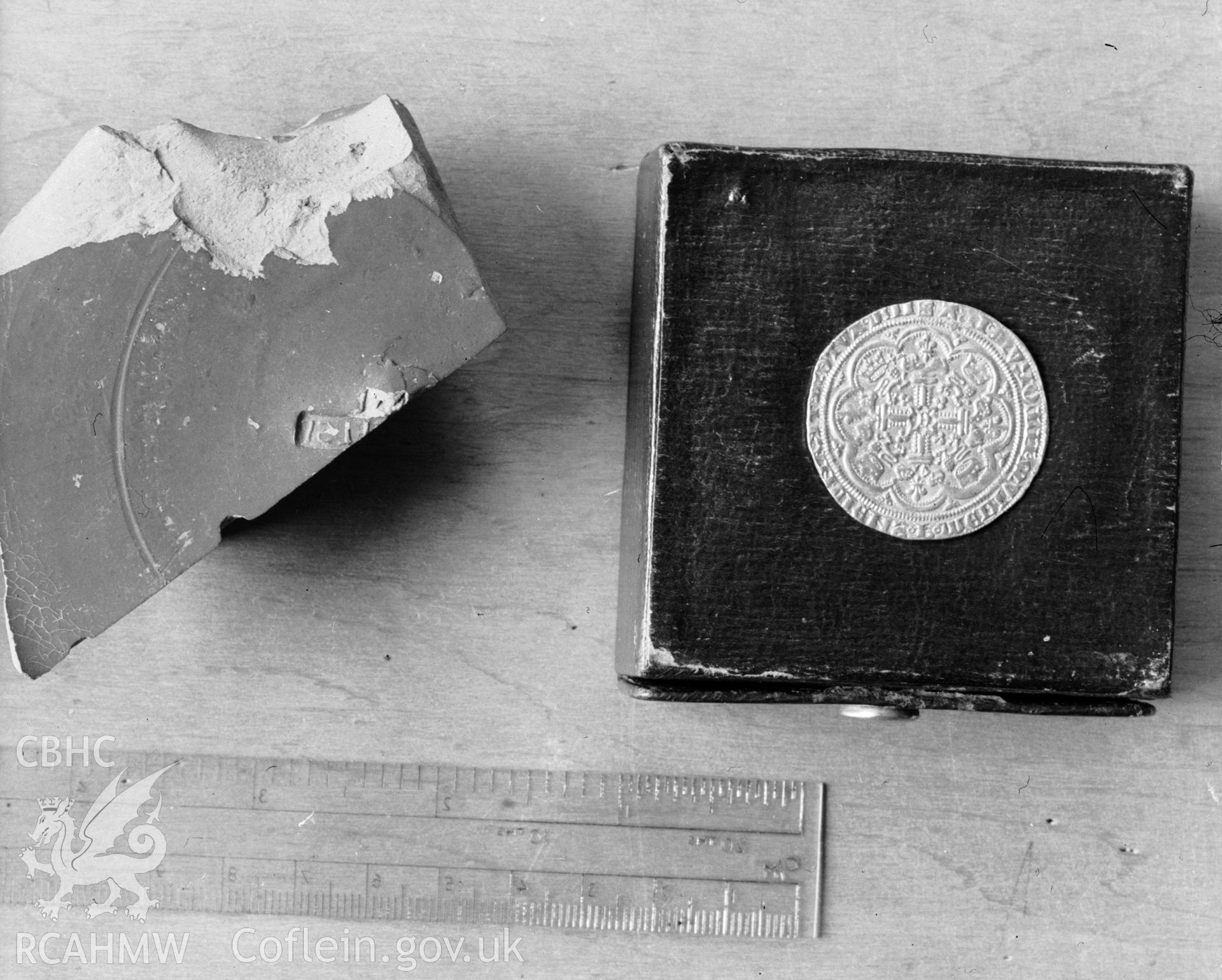 View of coin and pottery fragment from Caerhun Hall, Caerhun taken in 15.07.1950.