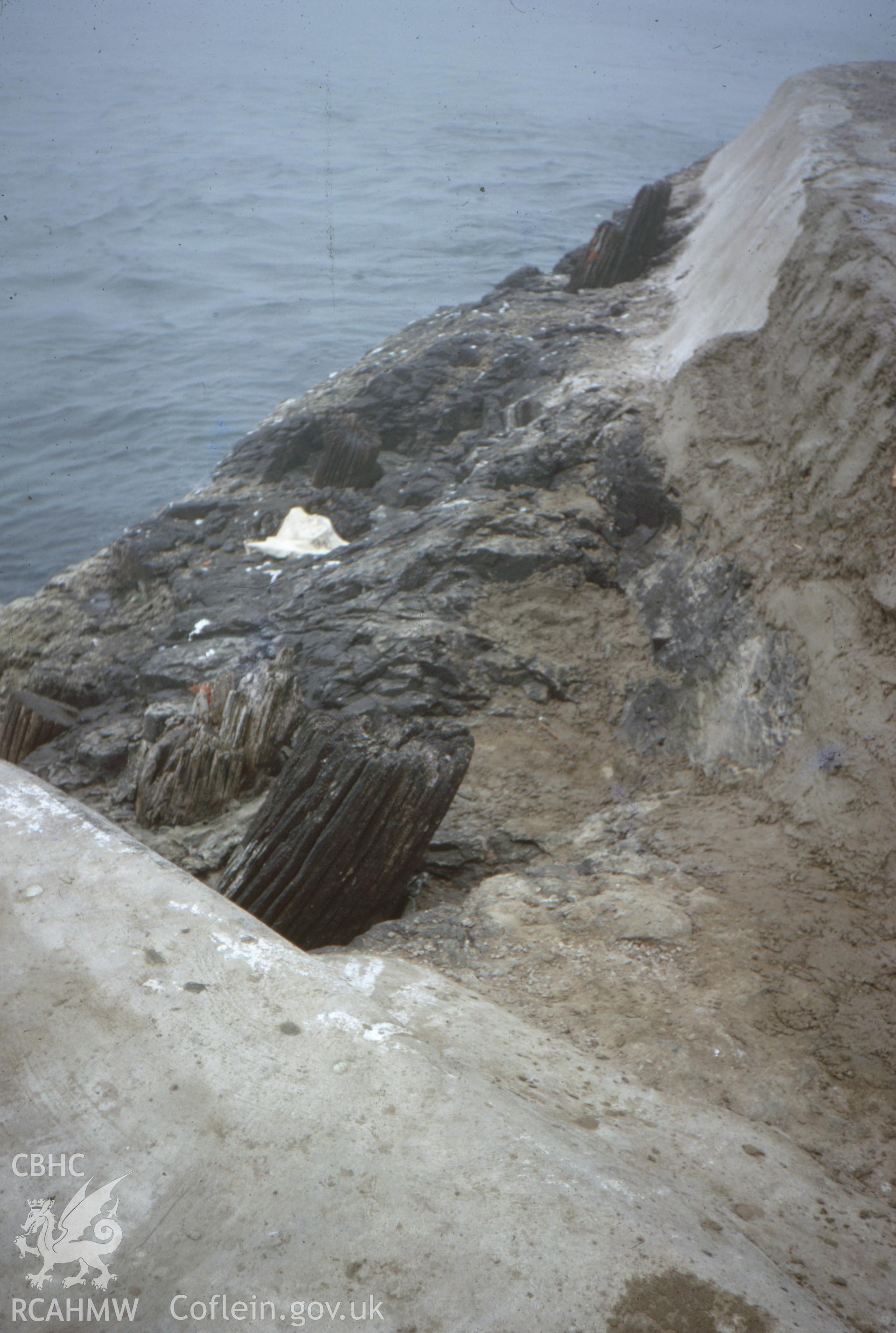 Colour slide showing posts of the wooden lighthouse.