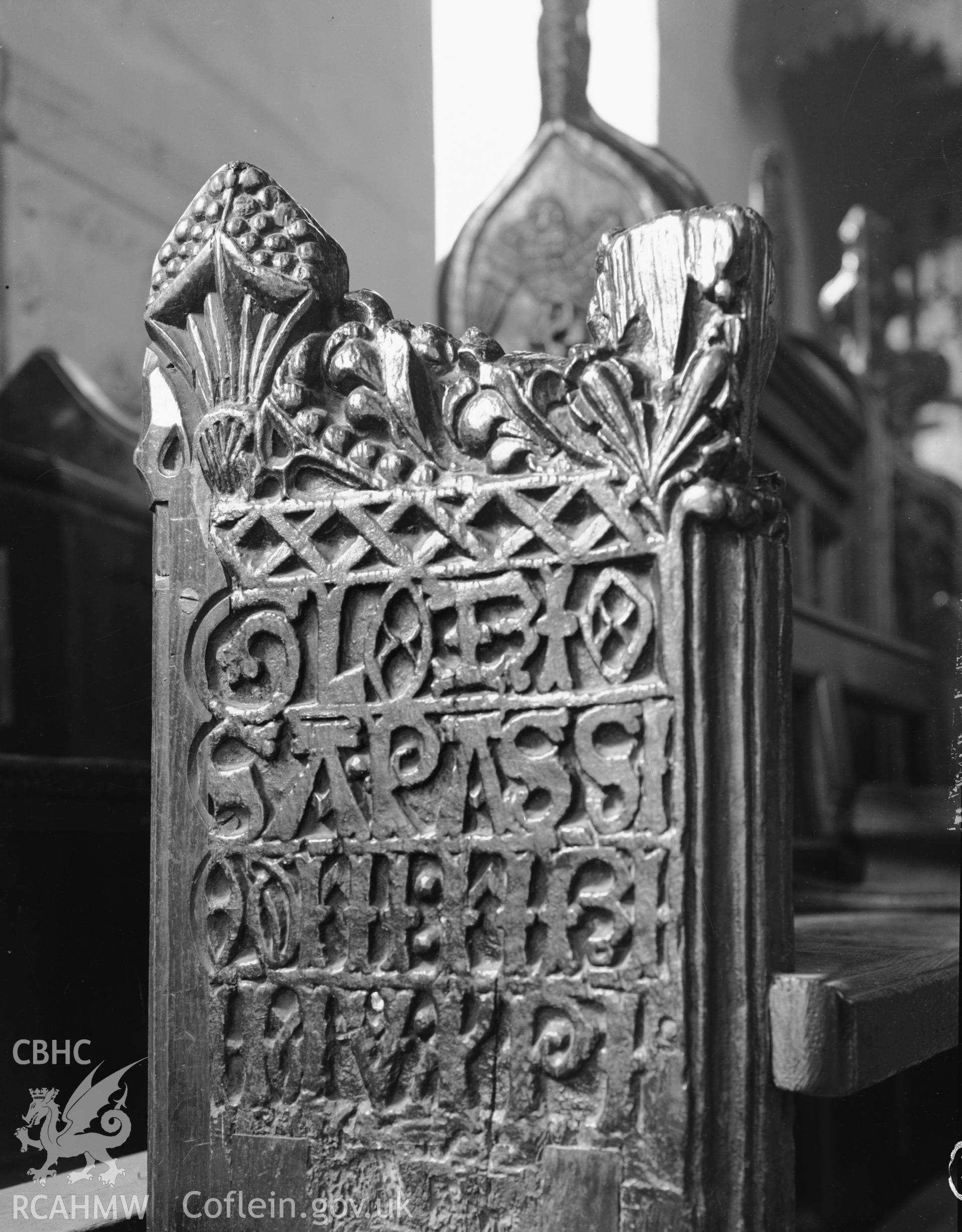 Interior view of St Marys Church Conwy showing detail of bench end, taken in 10.09.1951.