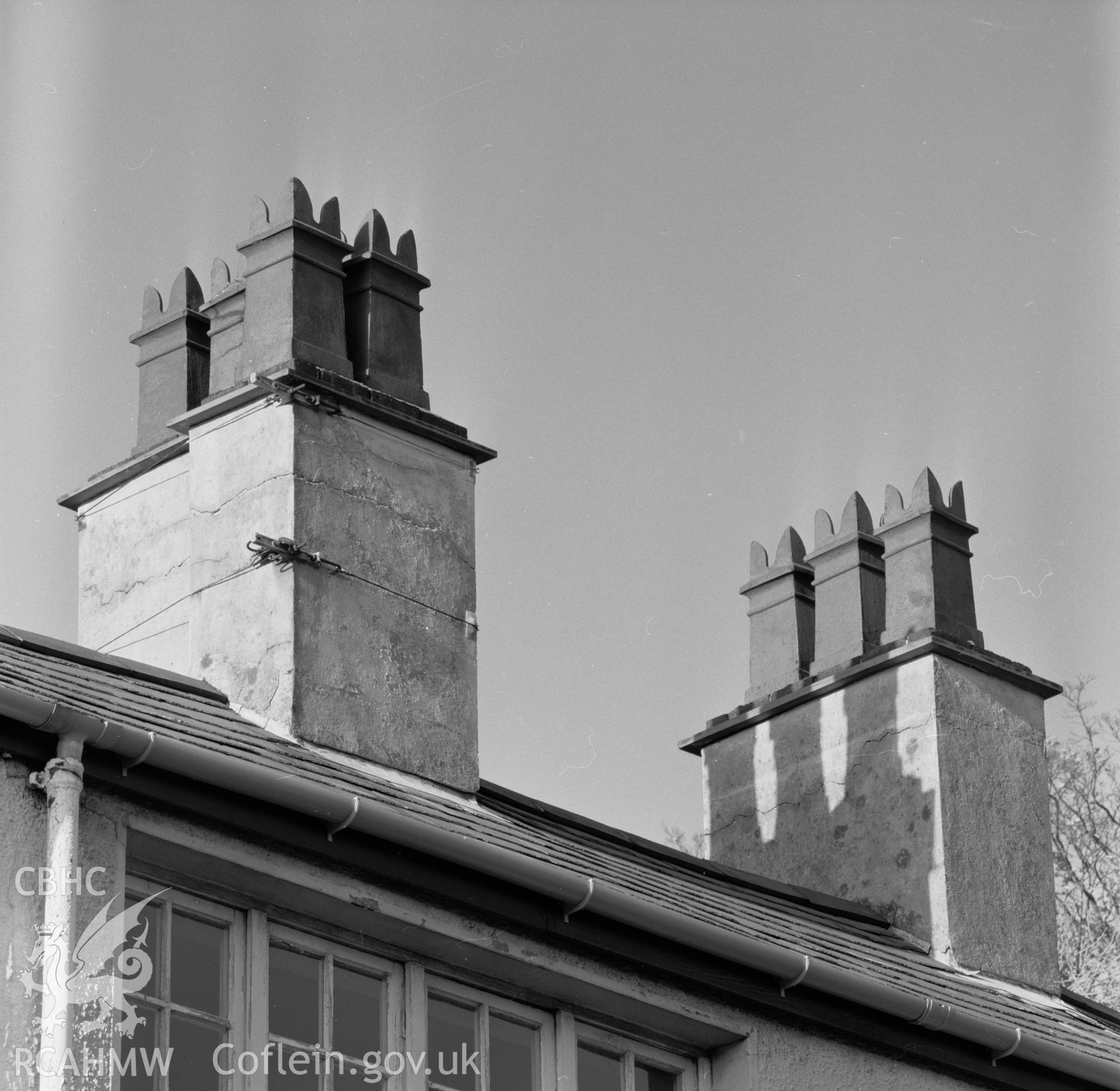 Exterior view showing chimneys.