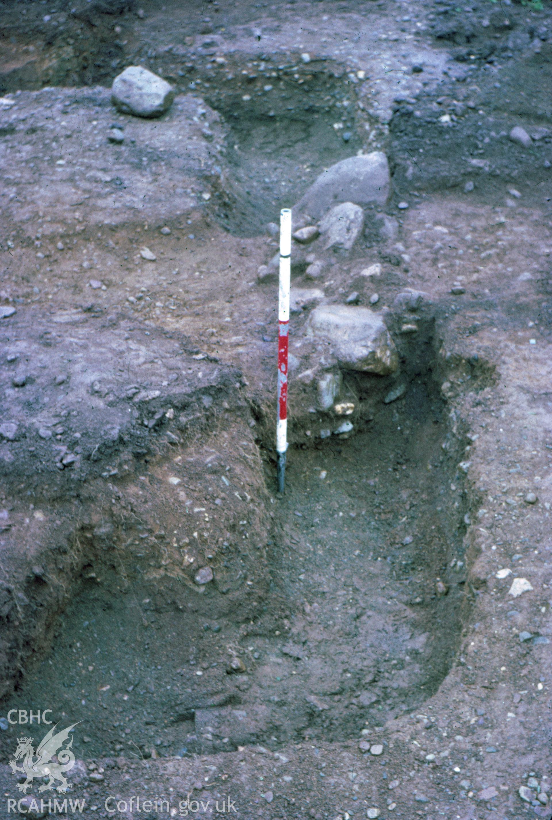Colour slide showing excavation of a religious building at Llandygai.