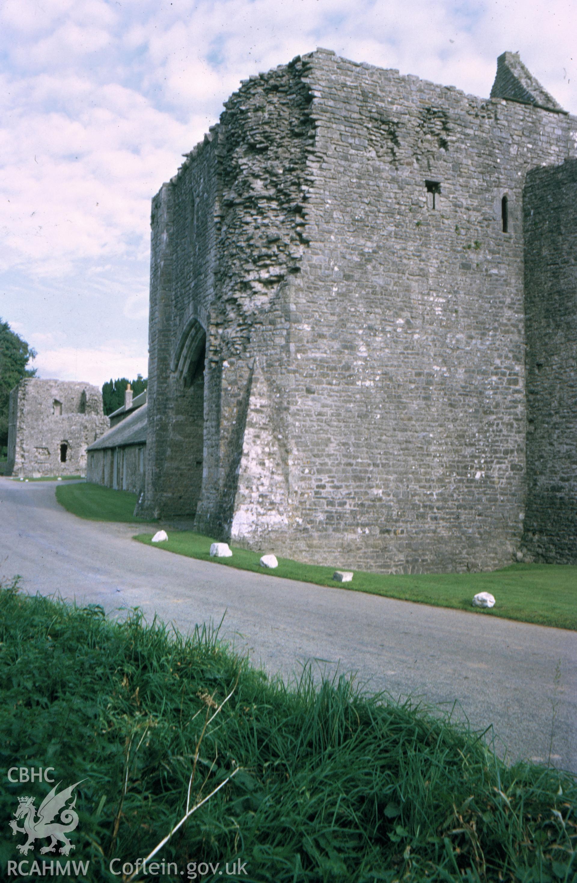 Colour slide of Ewenny Priory, showing the north gate and north curtain.