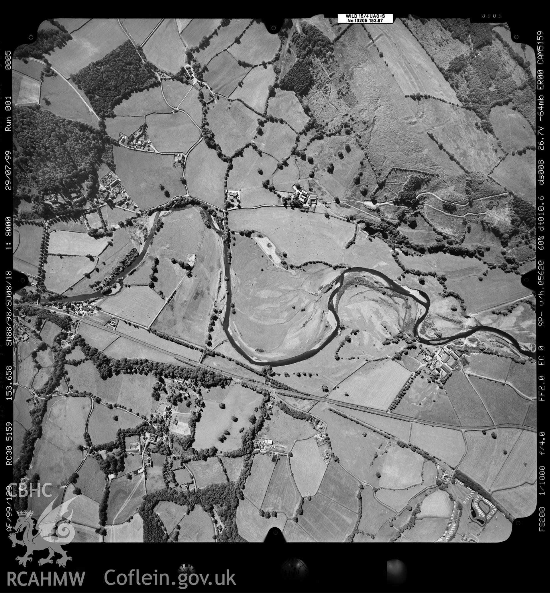 Digitized copy of an aerial photograph showing an area north-west of Llandinam, taken by Ordnance Survey,  1999.