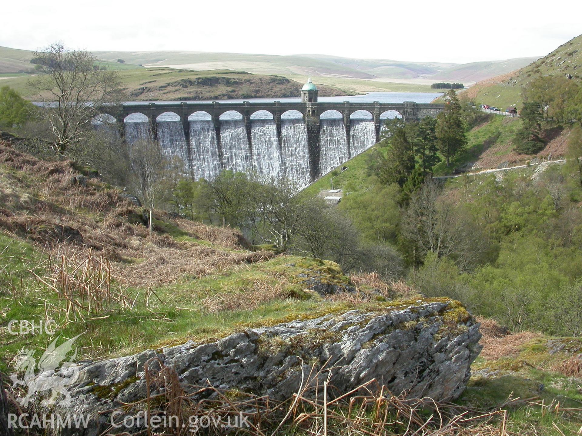 Downstream face of dam from south-west with the Craig Goch Reservoir beyond.