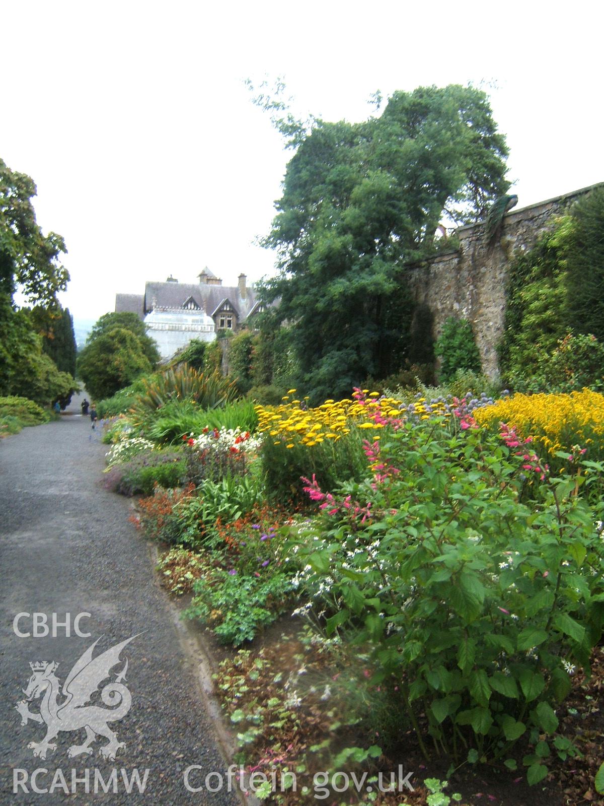 The East Garden herbaceous border looking south-west to the conservatory and house.