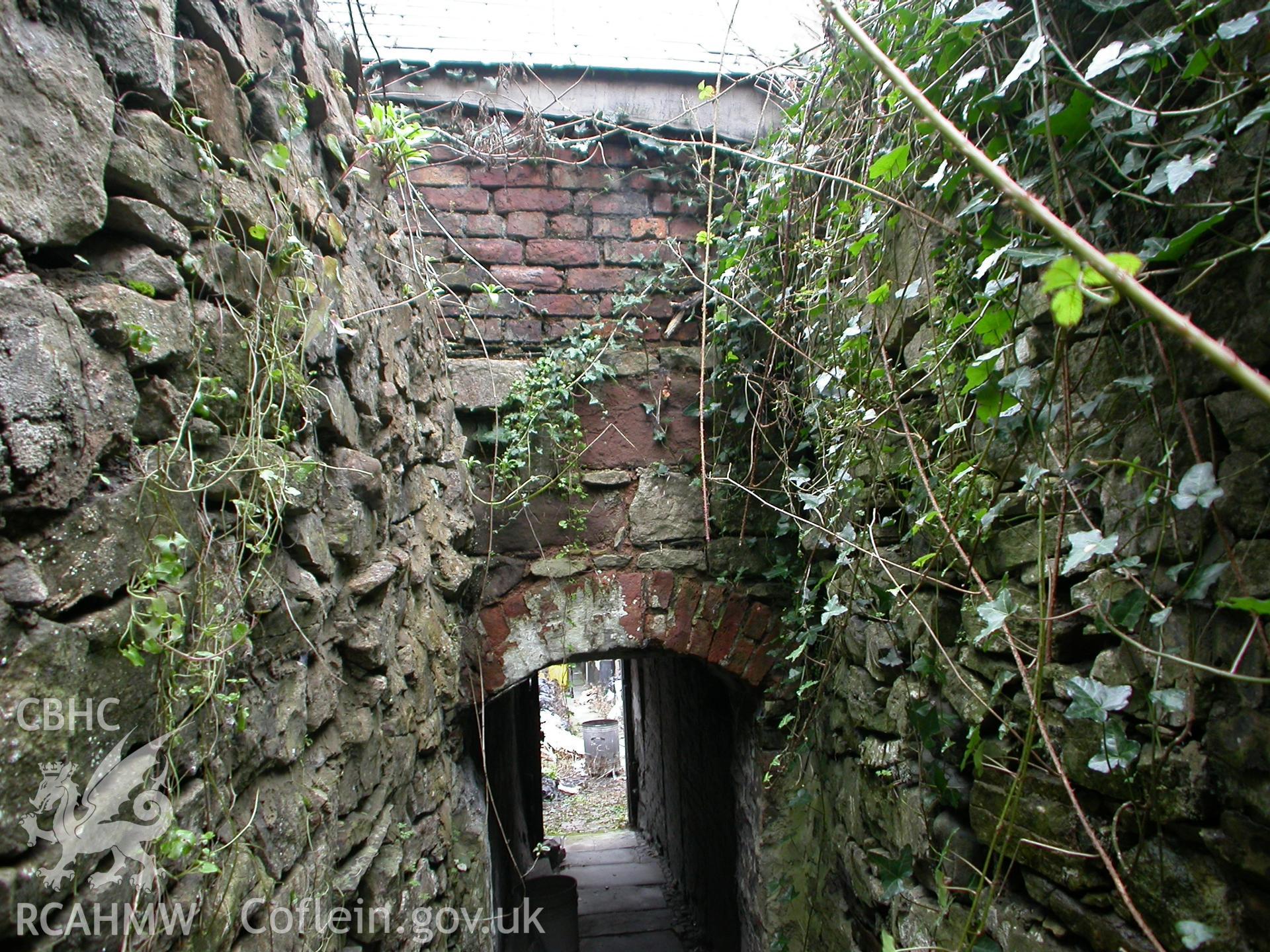 Rear garden entry to side-passage of bake-house.