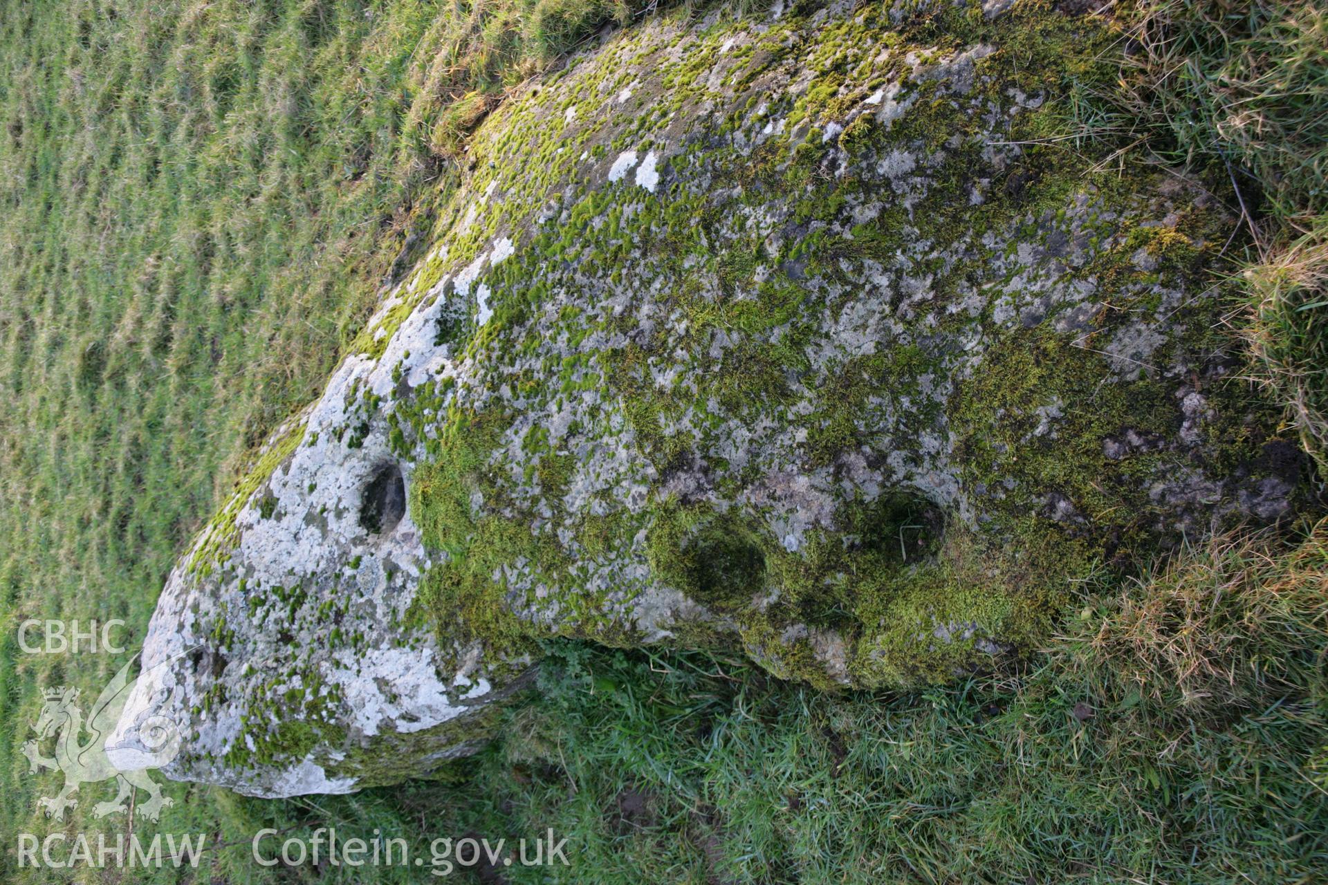 Cerrig y Gof chambered cairn; earthfast cup marked rock to north-west of tomb at SN 0356 3892, viewed from north-west.