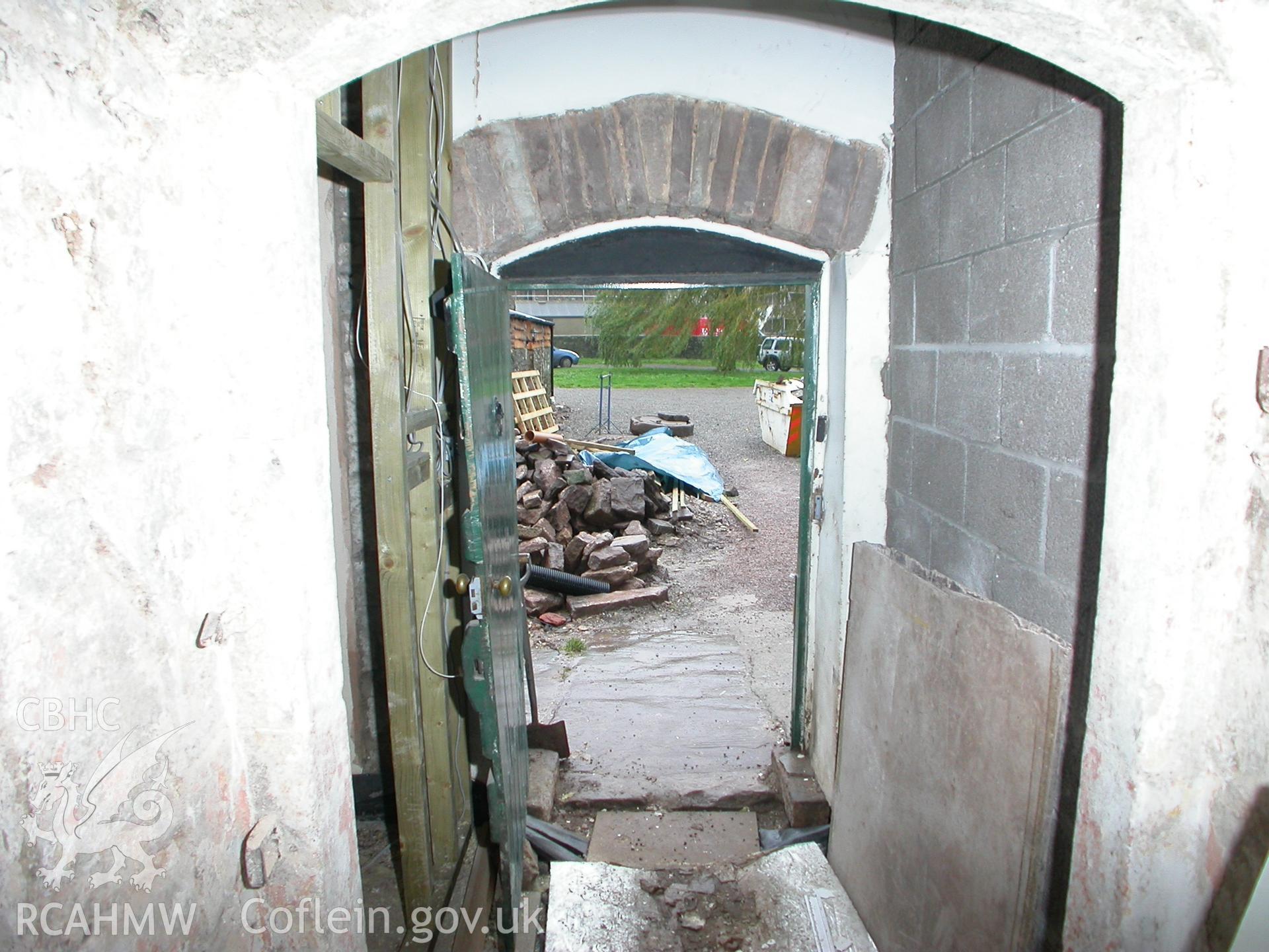 Doorway from Servant's-room to passage and arcade doorway beyond