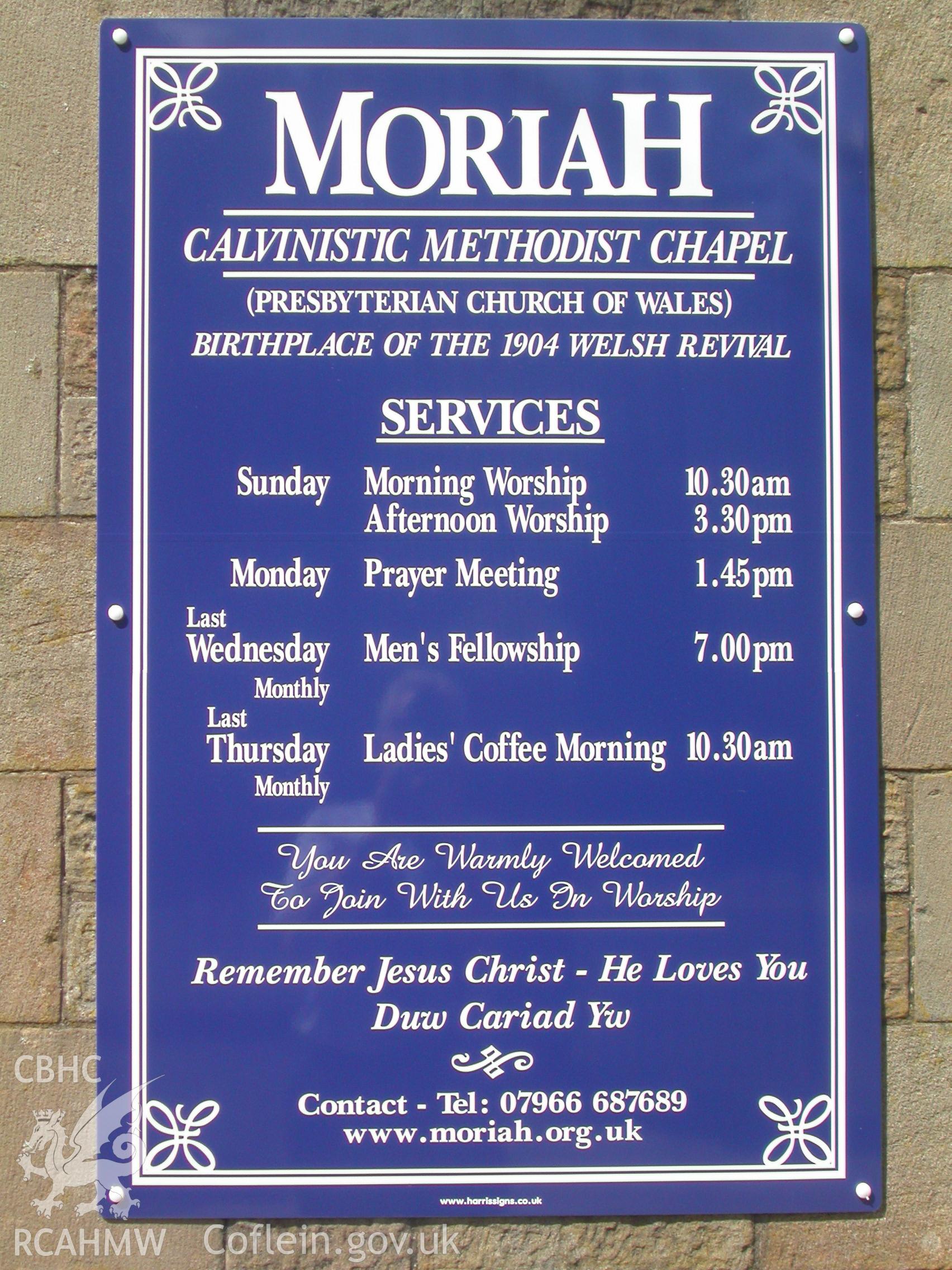 Noticeboard of present services (in English) at Moriah, screwed to left-hand side of central 1898 doorway.