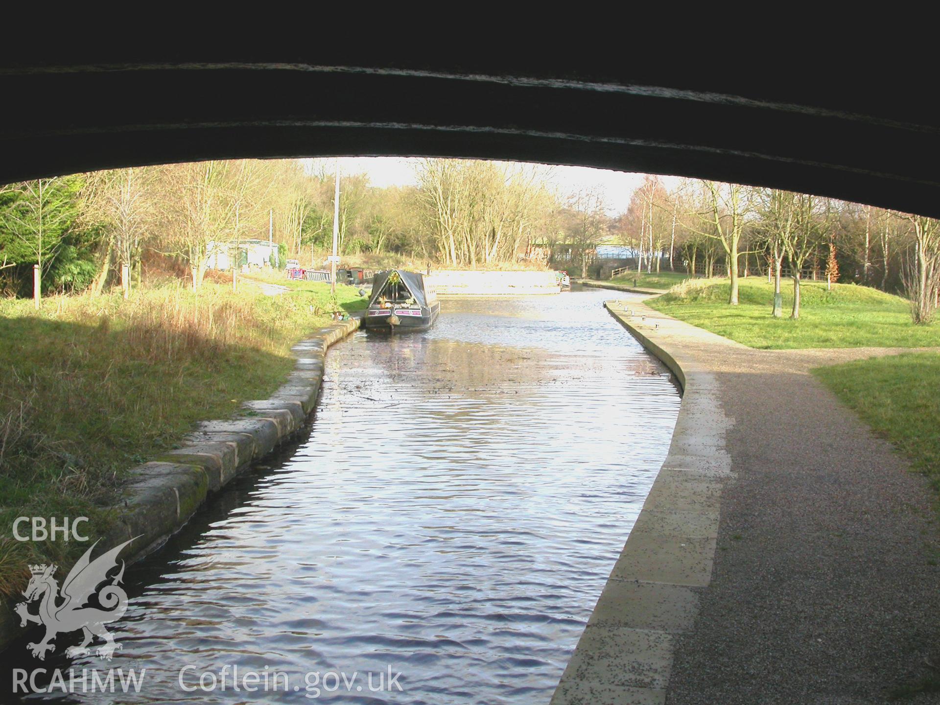 View north through the bridge towards the double canal arm flanking the railway unloading pier.