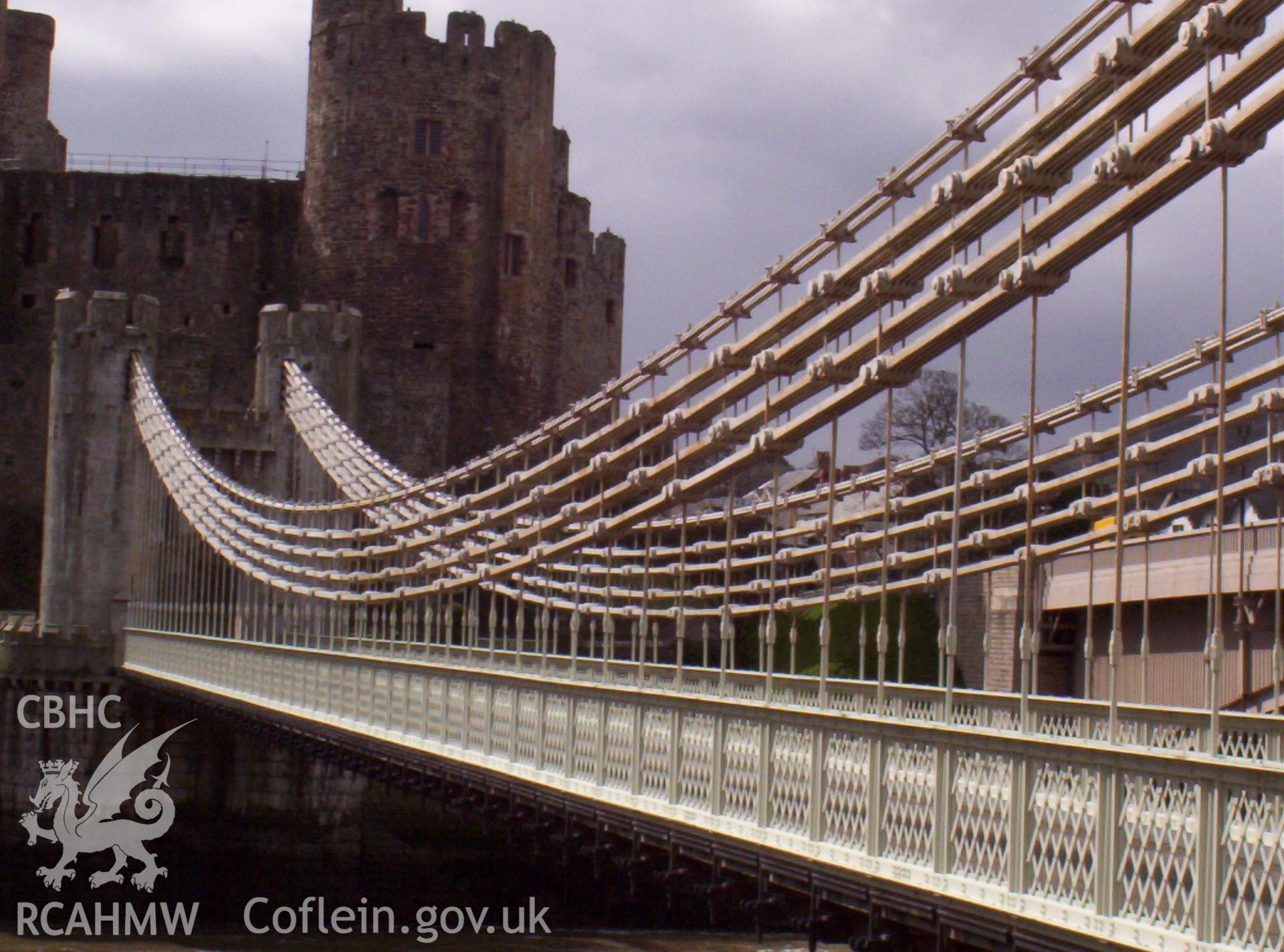 Detail of the south-east side of the bridge with Conwy Castle beyond.