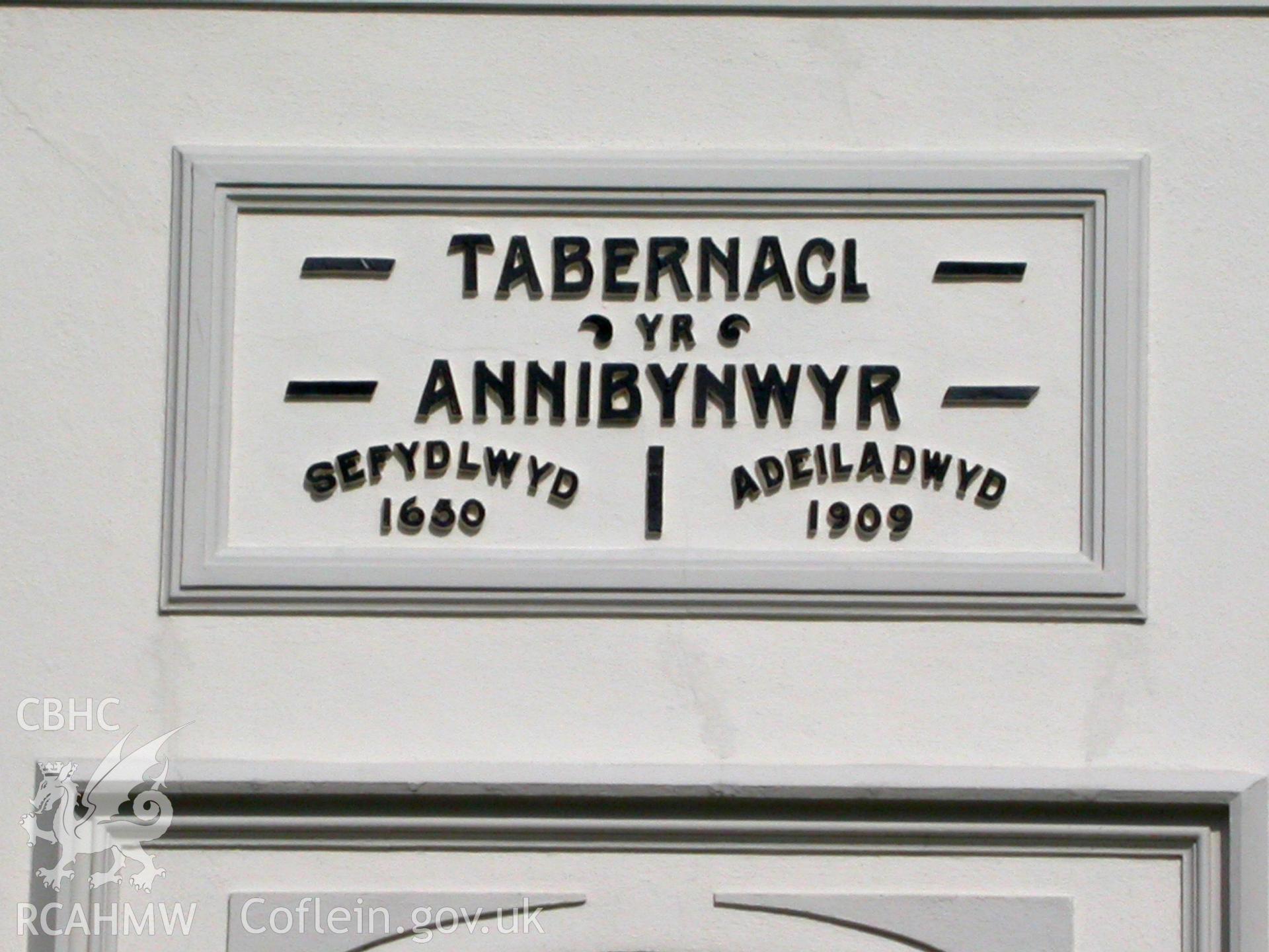 Date (1909) and name plaque over NW front door.