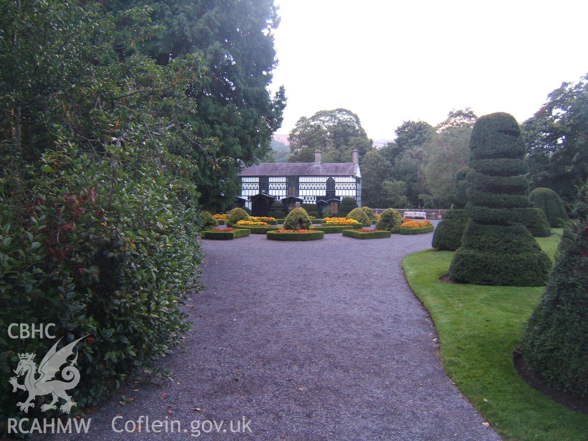 Drive from SW with topiary, flower-beds & entrance.