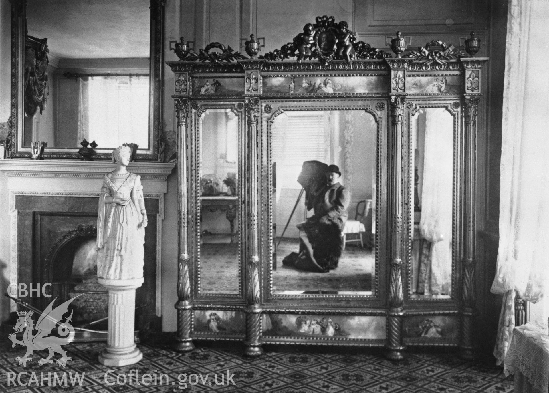 The gold wardrobe which was part of a set with the gold bed, the photographer Isaac Hayley is clearly visible in the mirror.