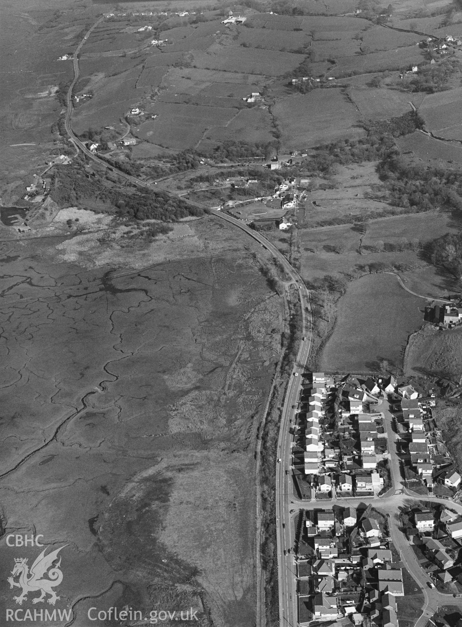 RCAHMW Black and white oblique aerial photograph of Penclawdd Canal, showing Berthlwydd, south-west of Gowerton. Taken on 25/03/1991 by CR Musson.