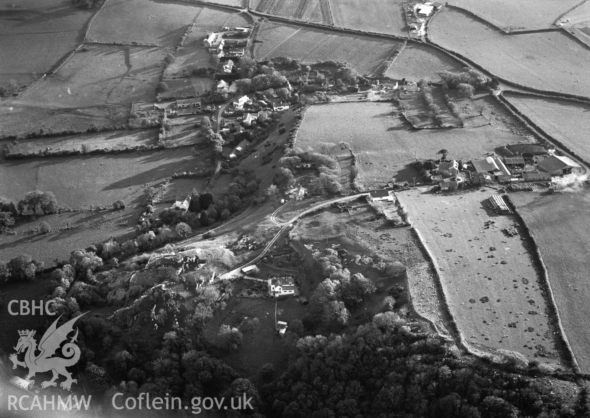 RCAHMW Black and white oblique aerial photograph of Landimor Castle; Bovehill Castle, Llangennith, Llanmadoc And Cheriton, taken by T.G.Driver on the 24/10/1997