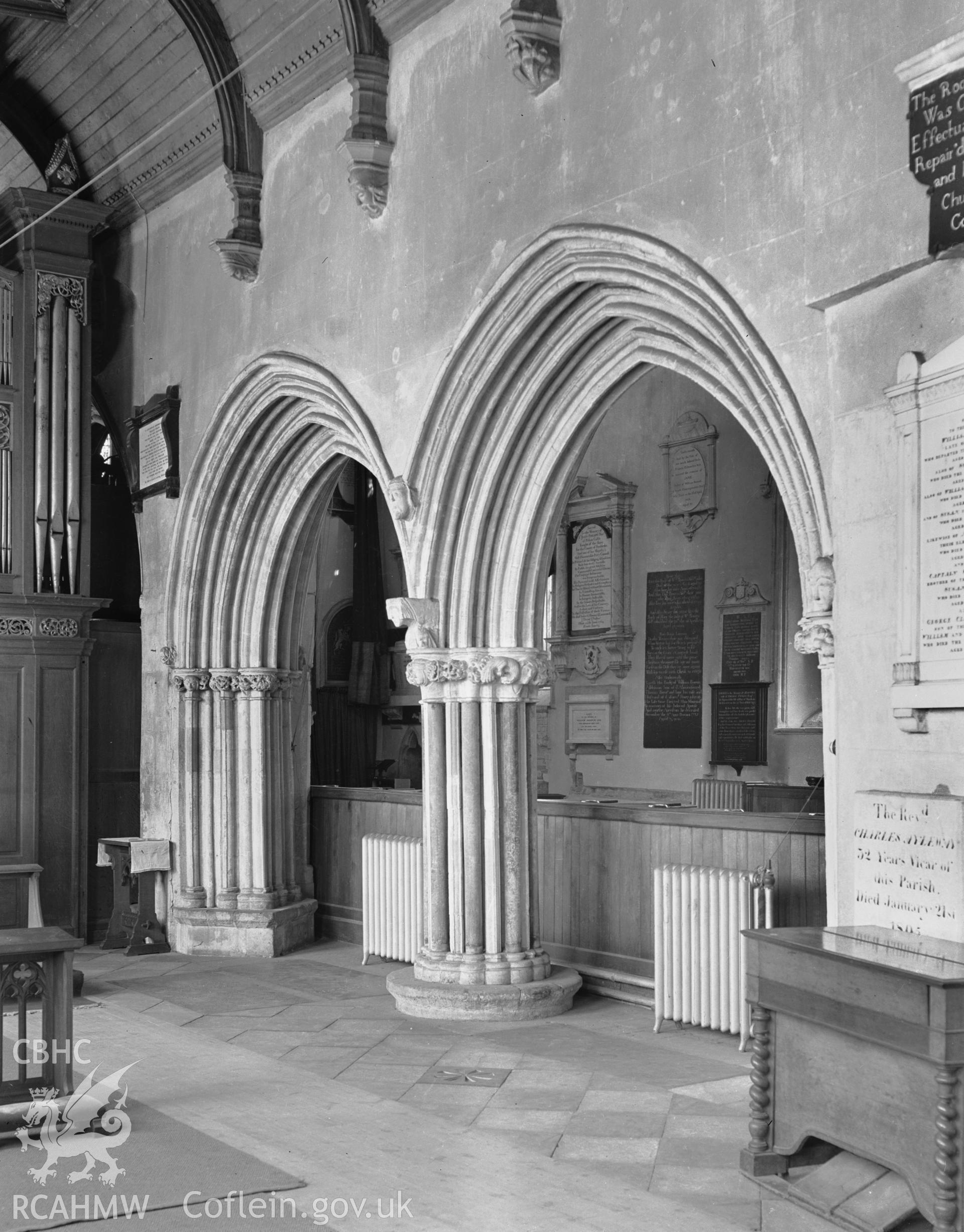 Interior view of the chancel arcade from the north aisle.