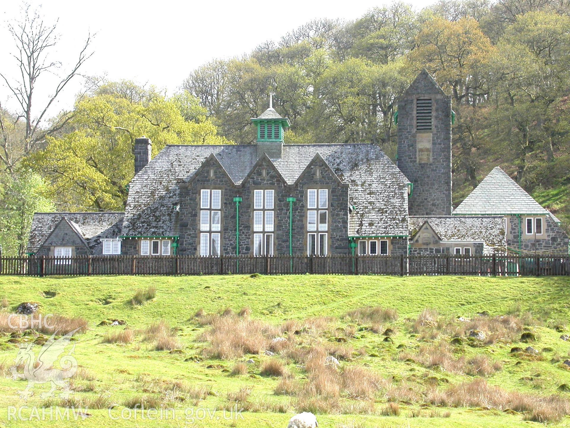 Former school in hillside setting, from the north.