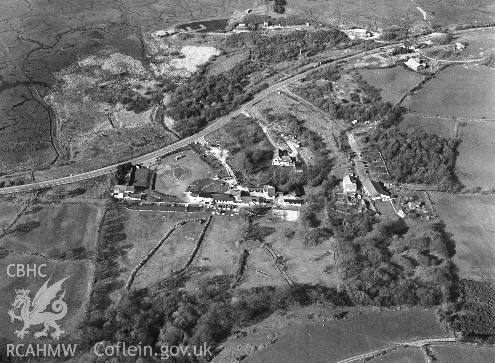 RCAHMW Black and white oblique aerial photograph of Penclawdd Canal, showing Berthlwydd, south-west of Gowerton. Taken on 25/03/1991 by CR Musson.