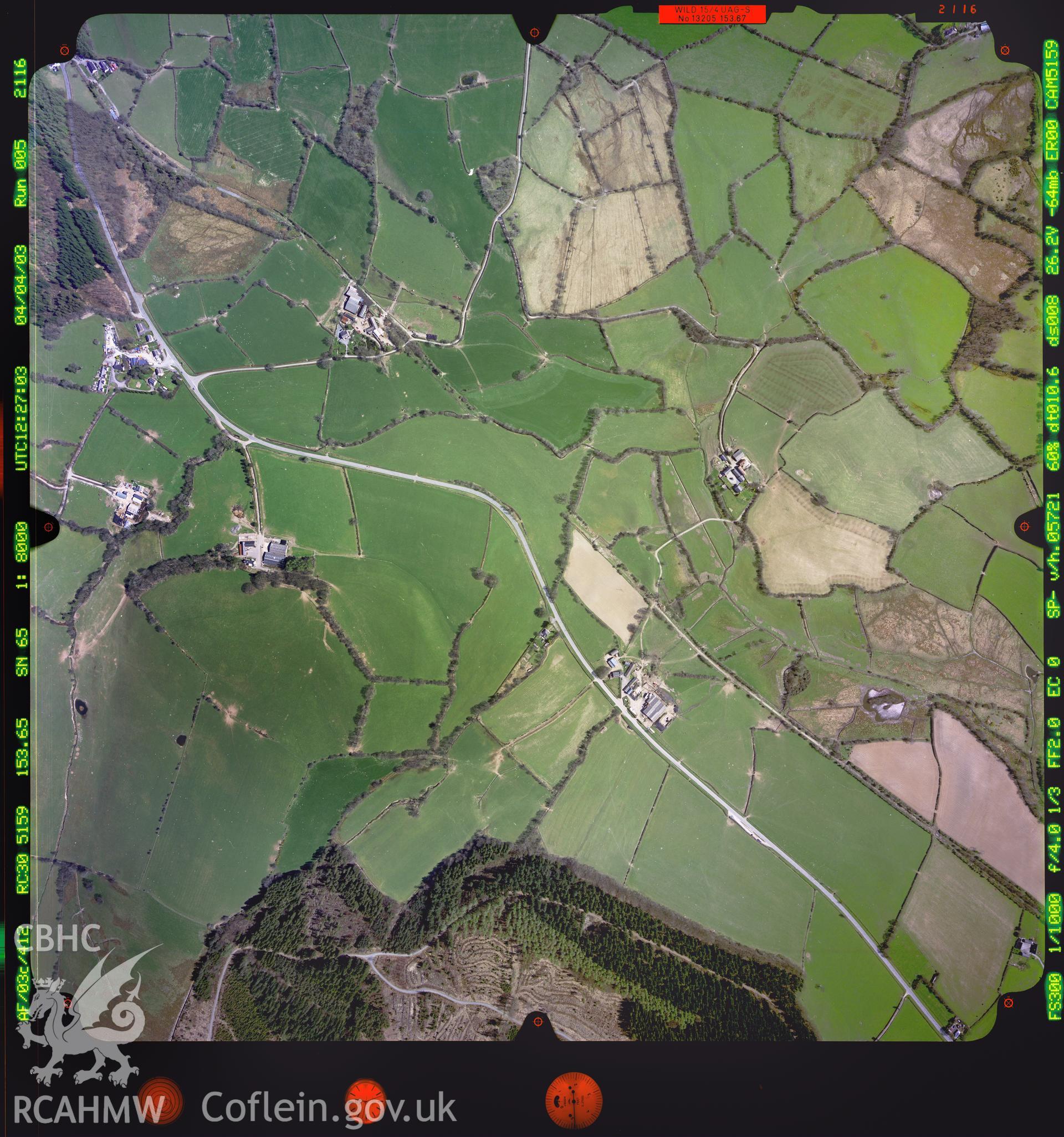 Digitized copy of a colour aerial photograph showing an area in Ceredigion, taken by Ordnance Survey, 2003.