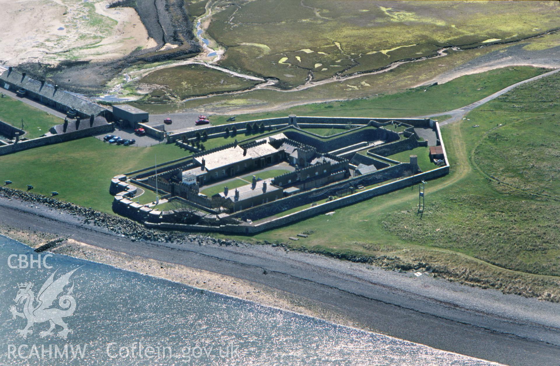 Slide of RCAHMW colour oblique aerial photograph of Fort Belan, taken by T.G. Driver, 18/4/1998.