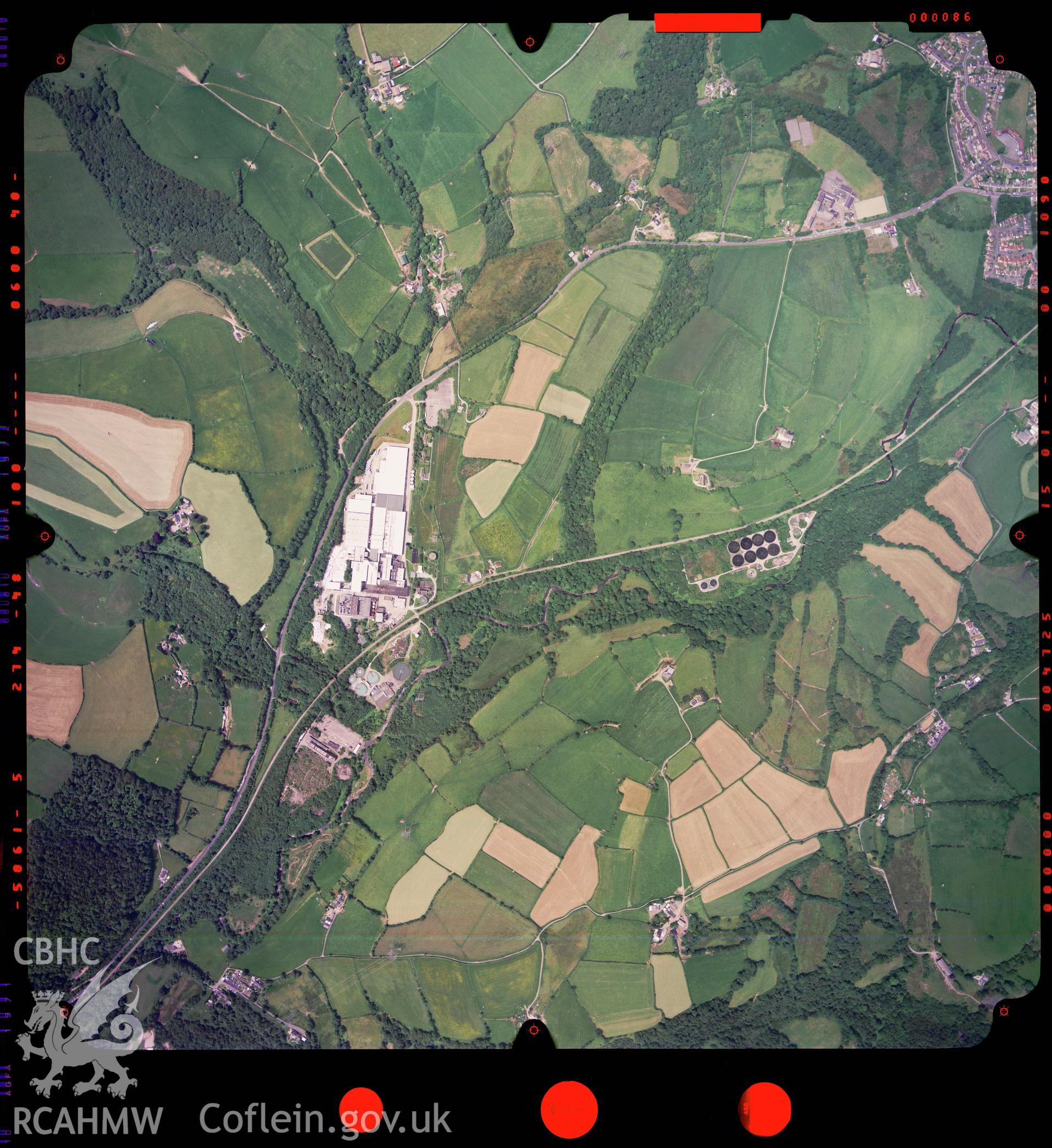 Digitized copy of a colour aerial photograph showing the area around Bridgend, taken by Ordnance Survey, 2003.