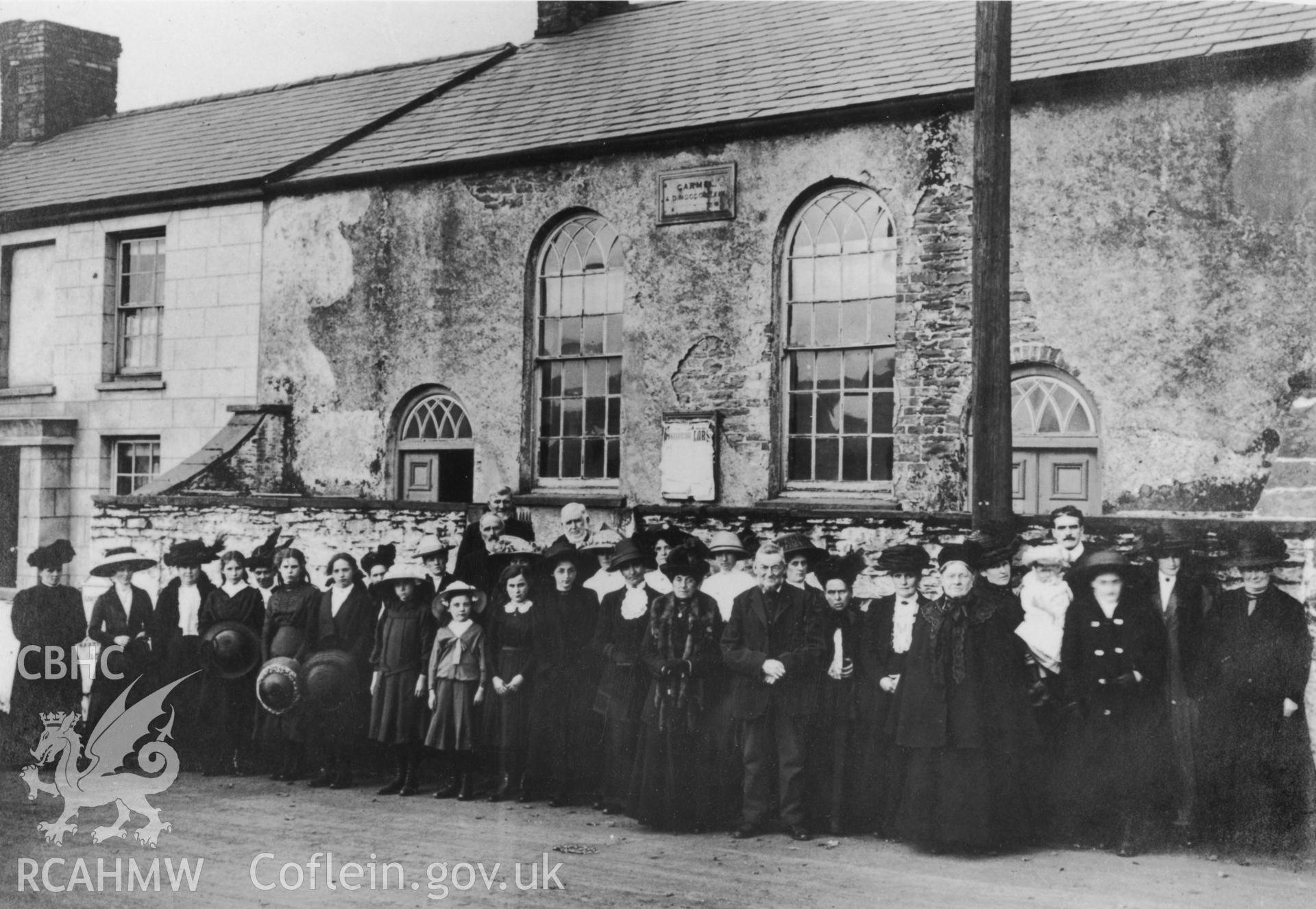 Photograph showing congregation outside Carmel CM chapel, Upper Boat. Dated early 20th century.