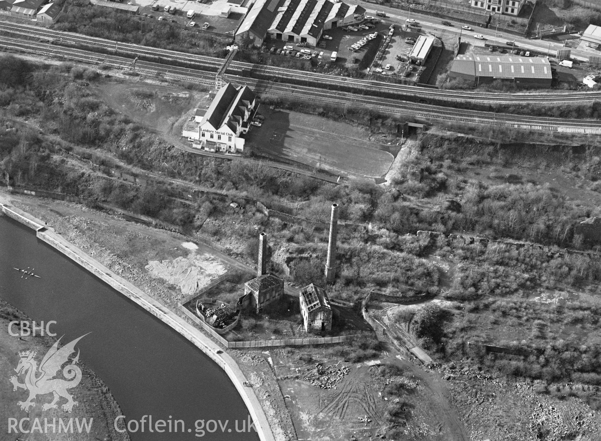 RCAHMW Black and white oblique aerial photograph of Hafod Copperworks 1860 Engine House, Swansea, Landore, taken by C.R.Musson on the 15/02/1997