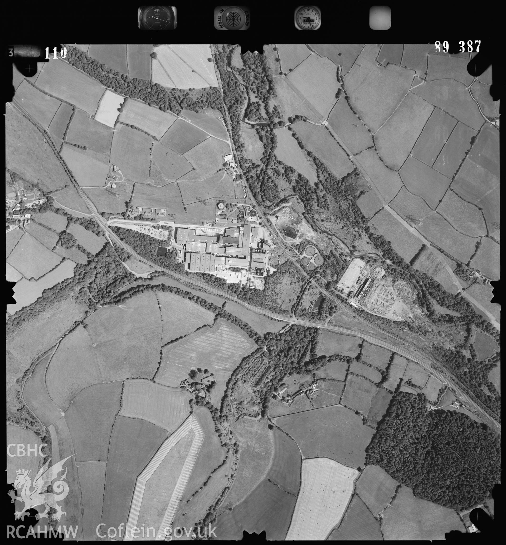 Digitized copy of an aerial photograph showing Bridgend Paper Mill,  taken by Ordnance Survey, 1989.