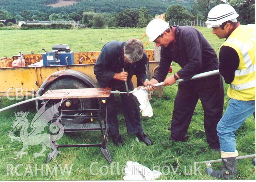 Colour digital photograph of men working at the Criggion radio site.