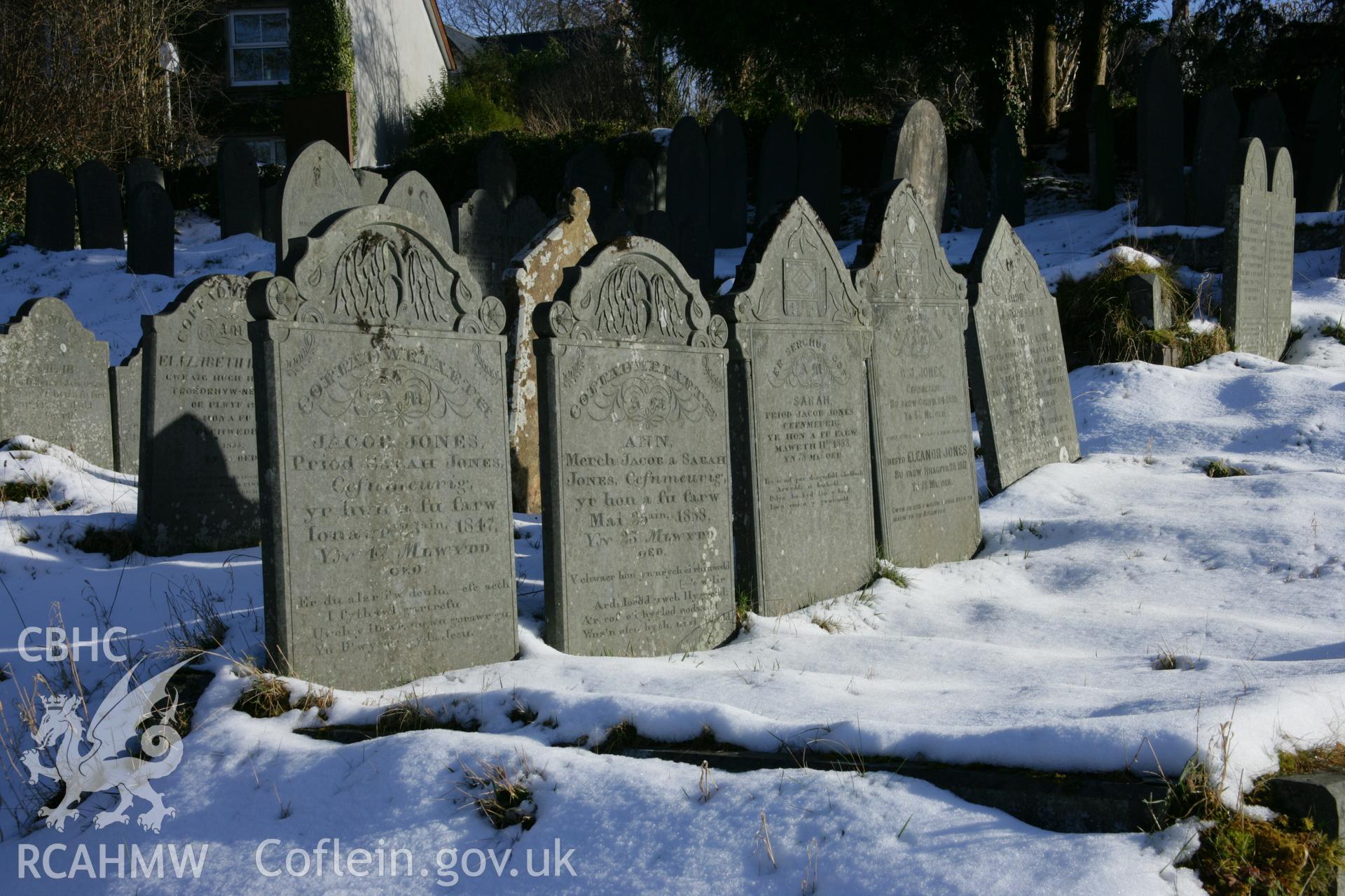 Salem Chapel, general view of gravestones in south-east part of cemetery, with snow.